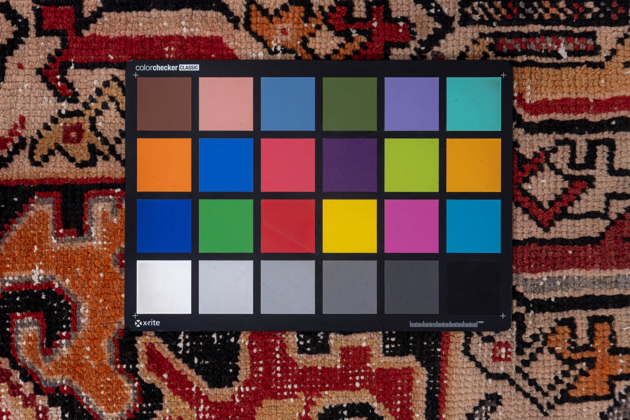 3' x 8' one-of-a-kind handmade vintage Oushak runner rug. Color palette: black, brown, charcoal, gray, pink, red, redwood