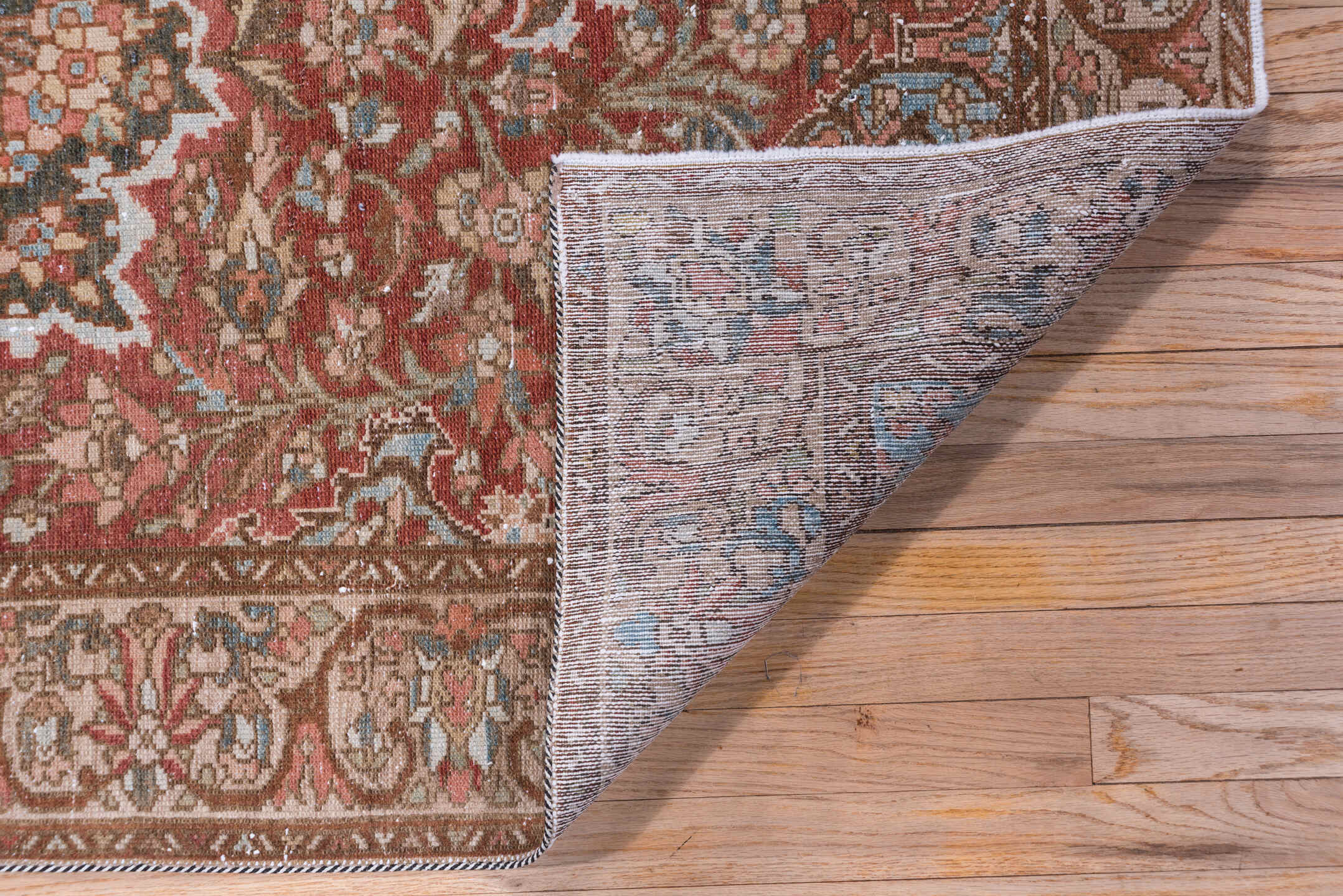 4' x 6' one-of-a-kind handmade vintage Baktiary small size rug. Color palette: rust, taupe, ivory, sky blue, brown, rose