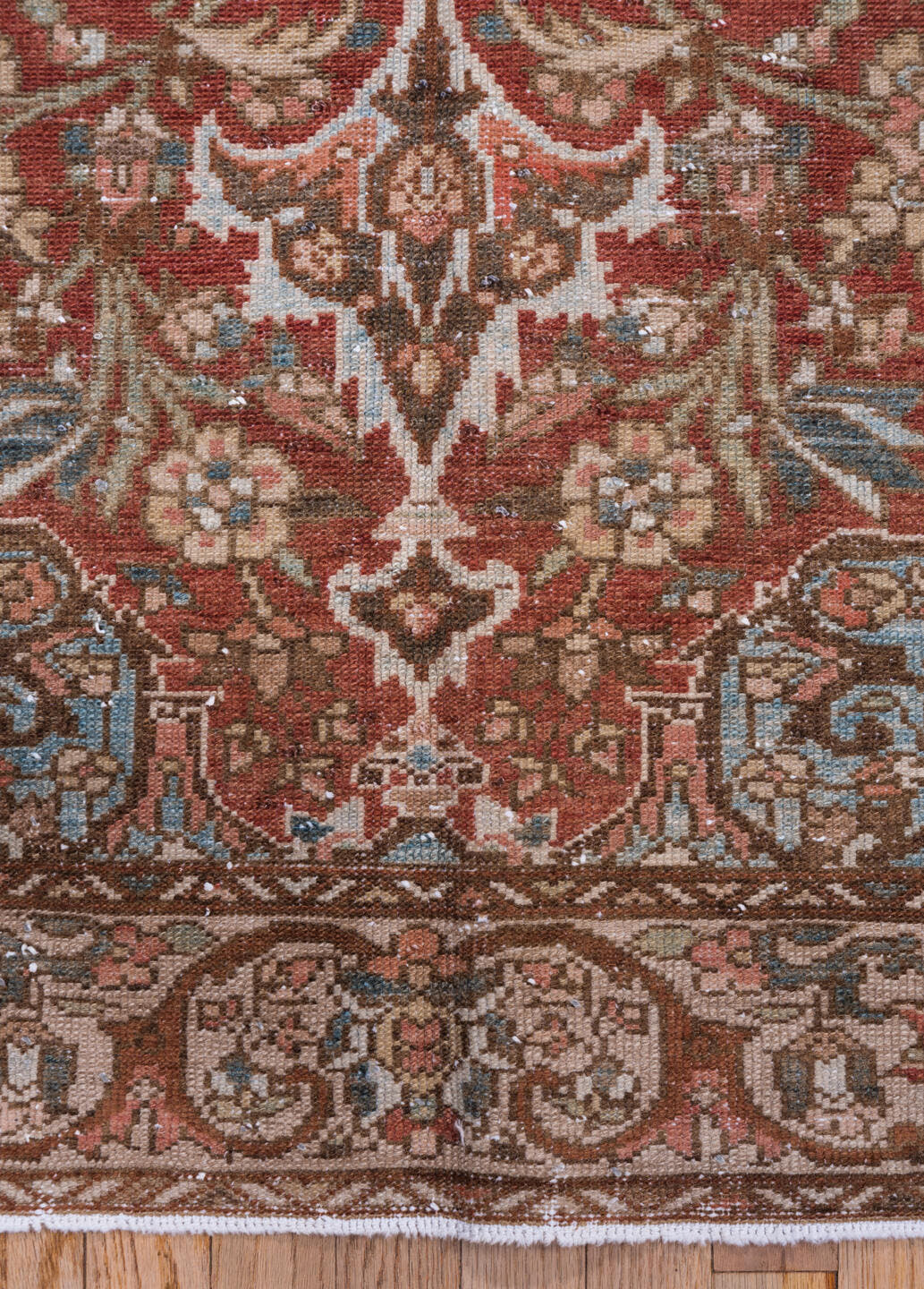 4' x 6' one-of-a-kind handmade vintage Baktiary small size rug. Color palette: rust, taupe, ivory, sky blue, brown, rose