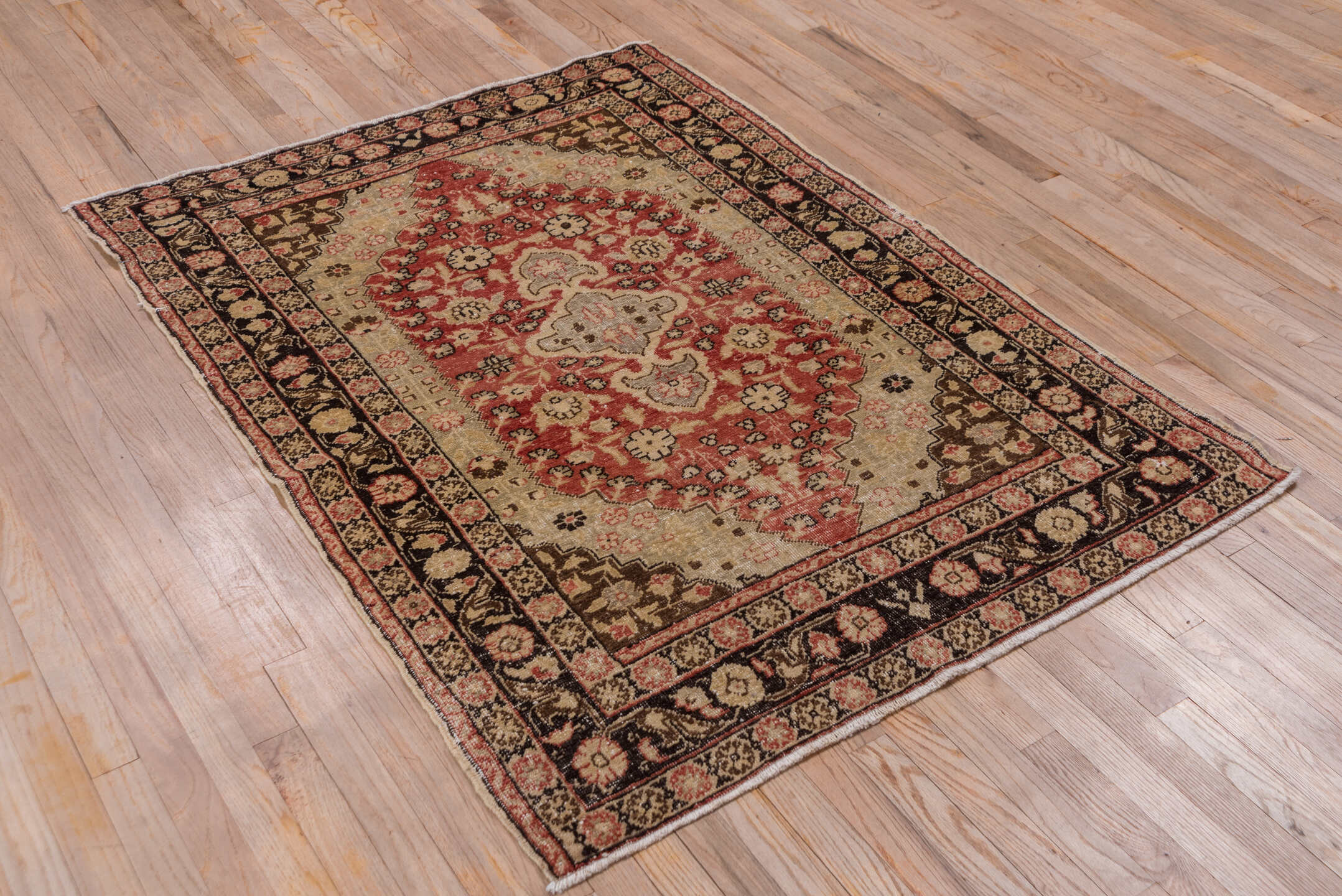 4' x 5' one-of-a-kind handmade vintage Oushak small size rug. Color palette: ivory, terracotta, brown, rose, charcoal, taupe