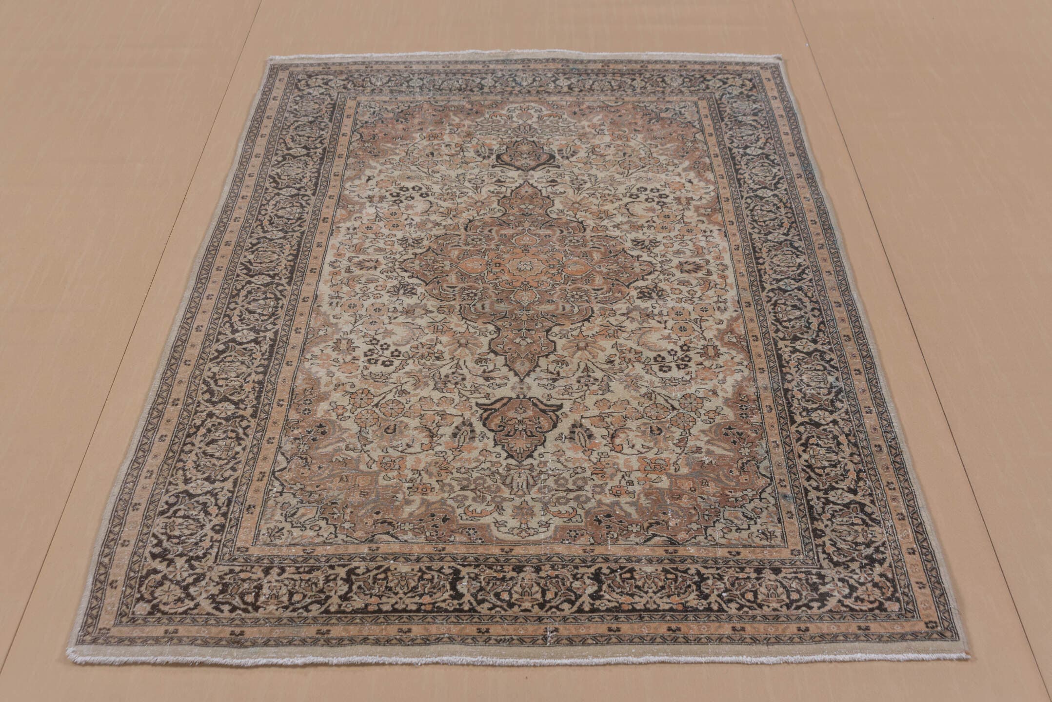 4' x 6' one-of-a-kind handmade vintage Sivas small size rug. Color palette: ivory, camel, taupe, charcoal, terra cotta