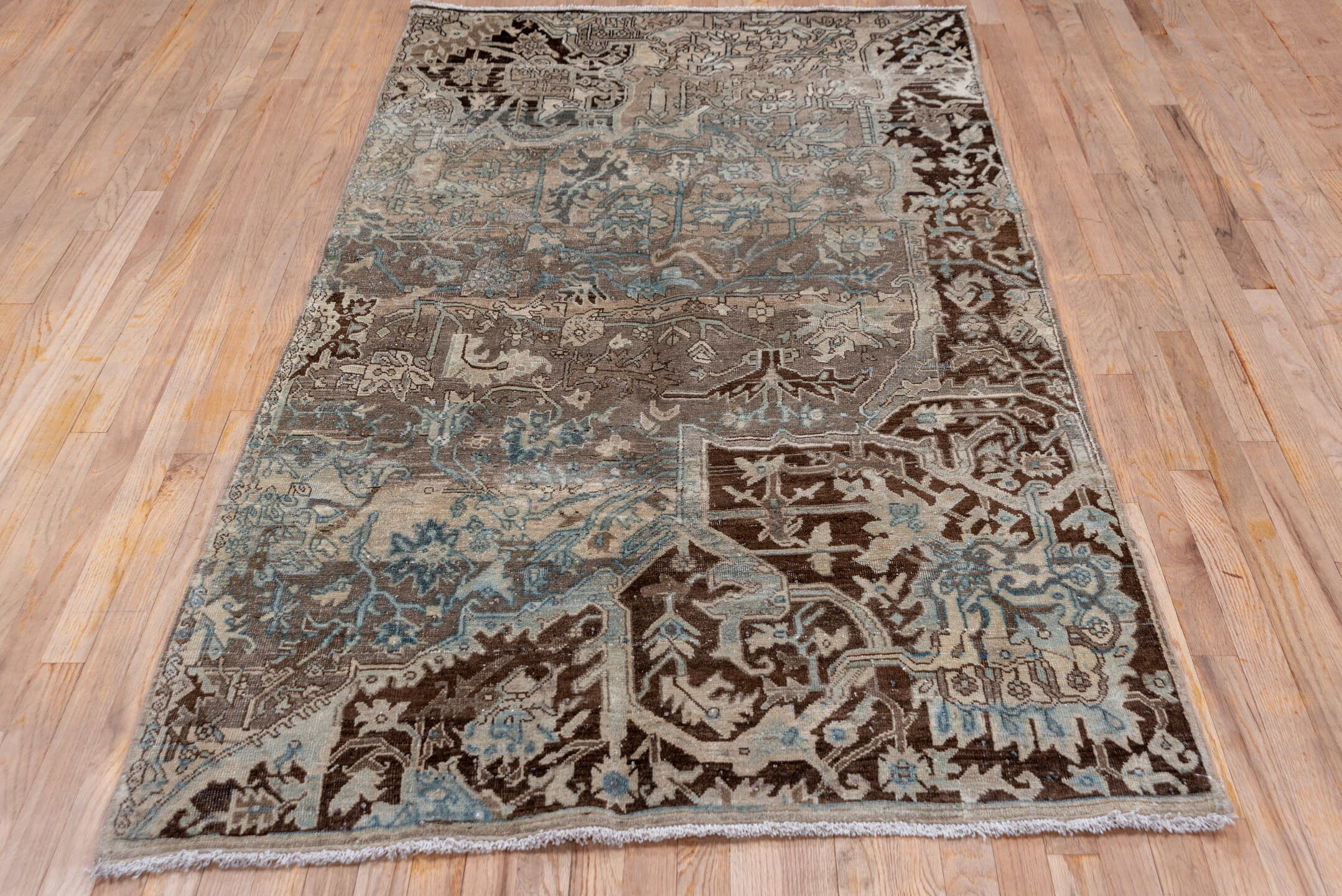 4' x 7' one-of-a-kind handmade vintage Tabriz rug. Color palette: taupe, brown, ivory, charcoal, pale_blue, slate, camel