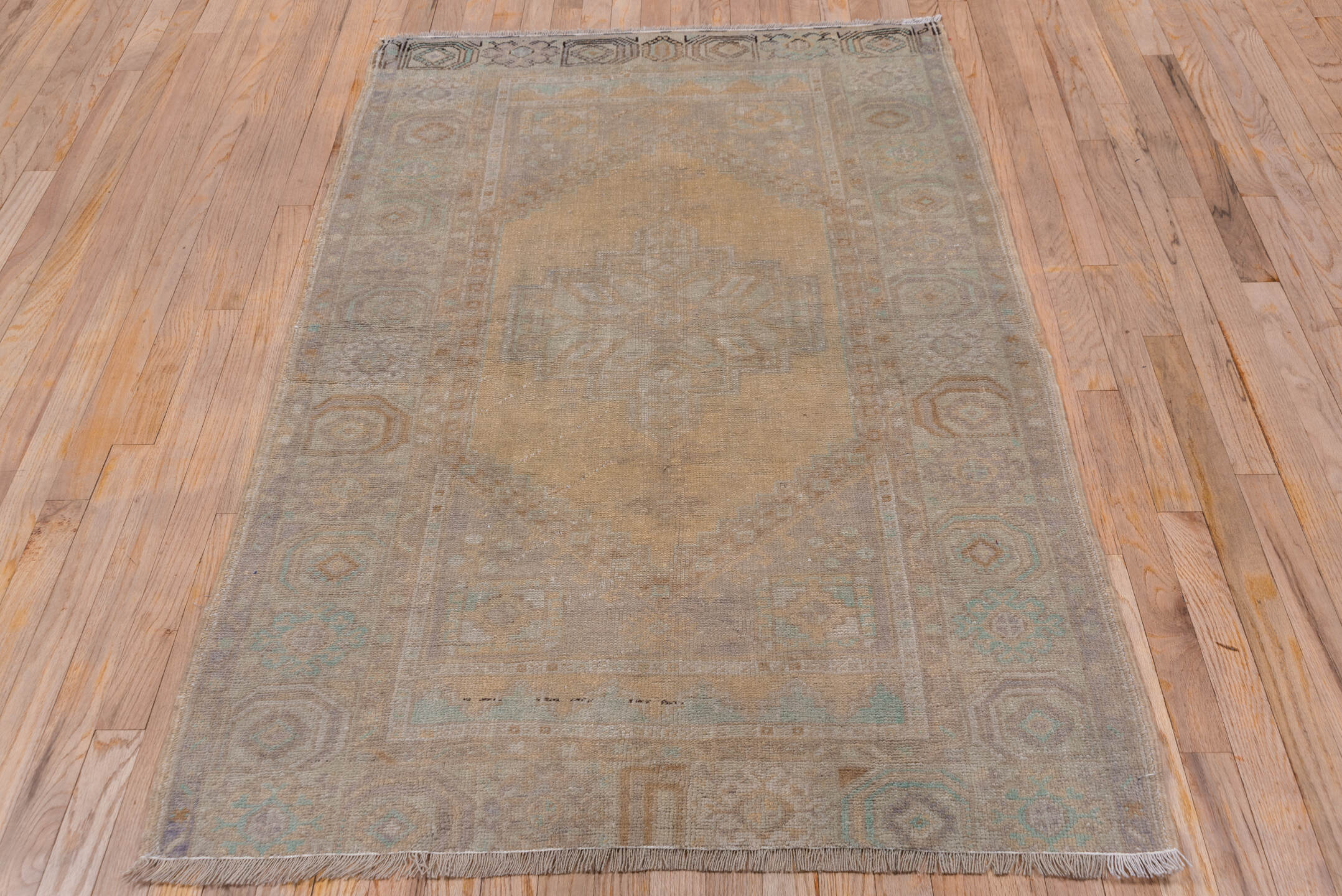 3' x 6' one-of-a-kind handmade vintage Oushak small size rug. Color palette: tan, taupe, beige, ivory, pale aqua, camel