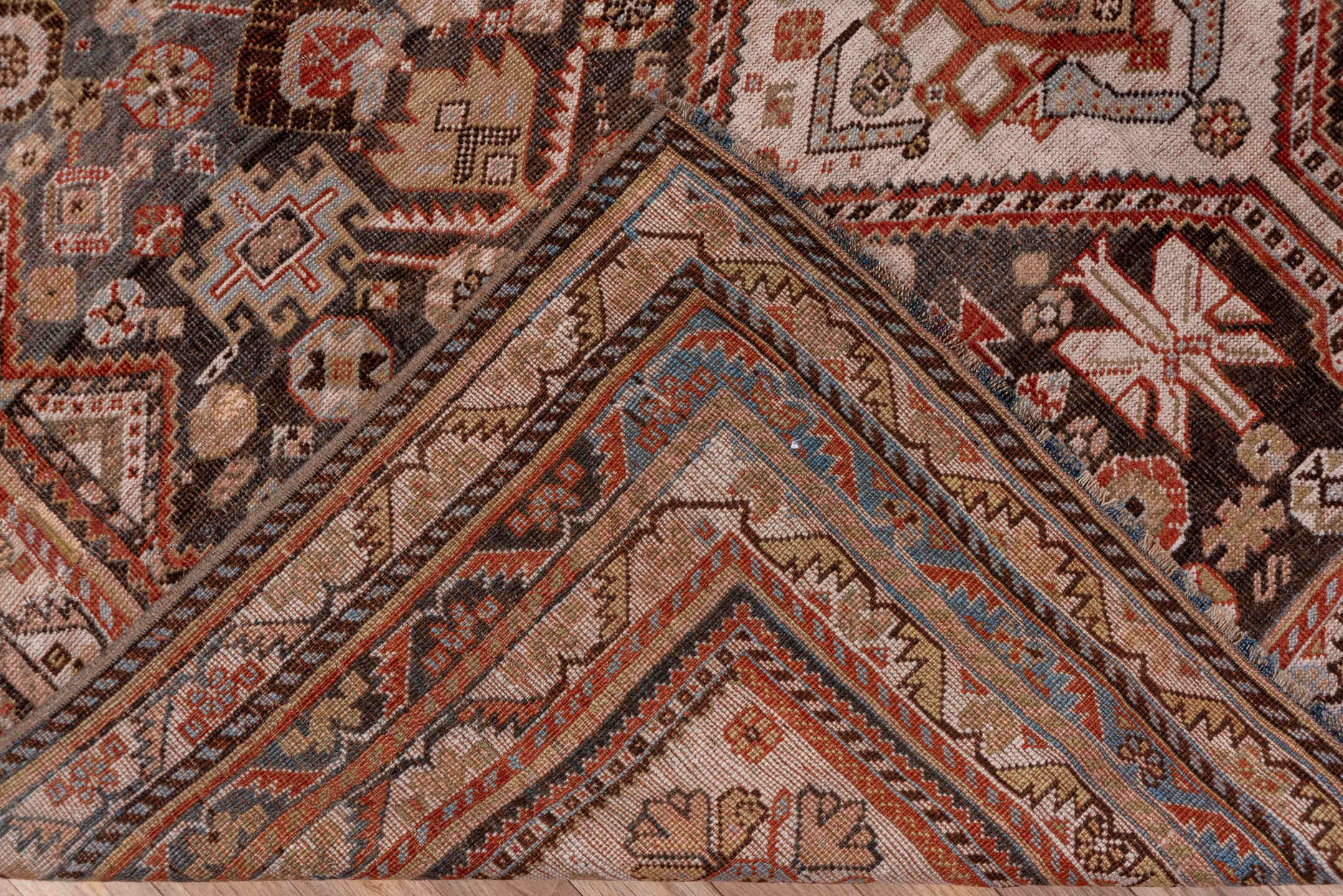 5' x 10' one-of-a-kind handmade antique Qashqai medium size rug. Color palette: ivory, charcoal, rust, slate, taupe, camel