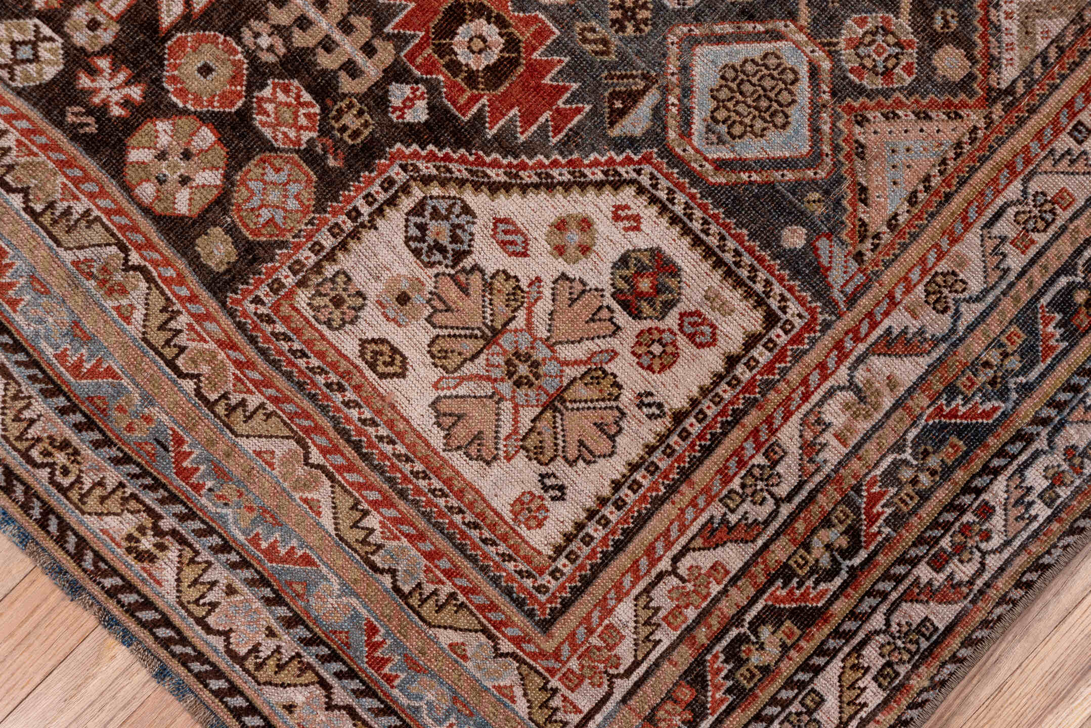 5' x 10' one-of-a-kind handmade antique Qashqai medium size rug. Color palette: ivory, charcoal, rust, slate, taupe, camel
