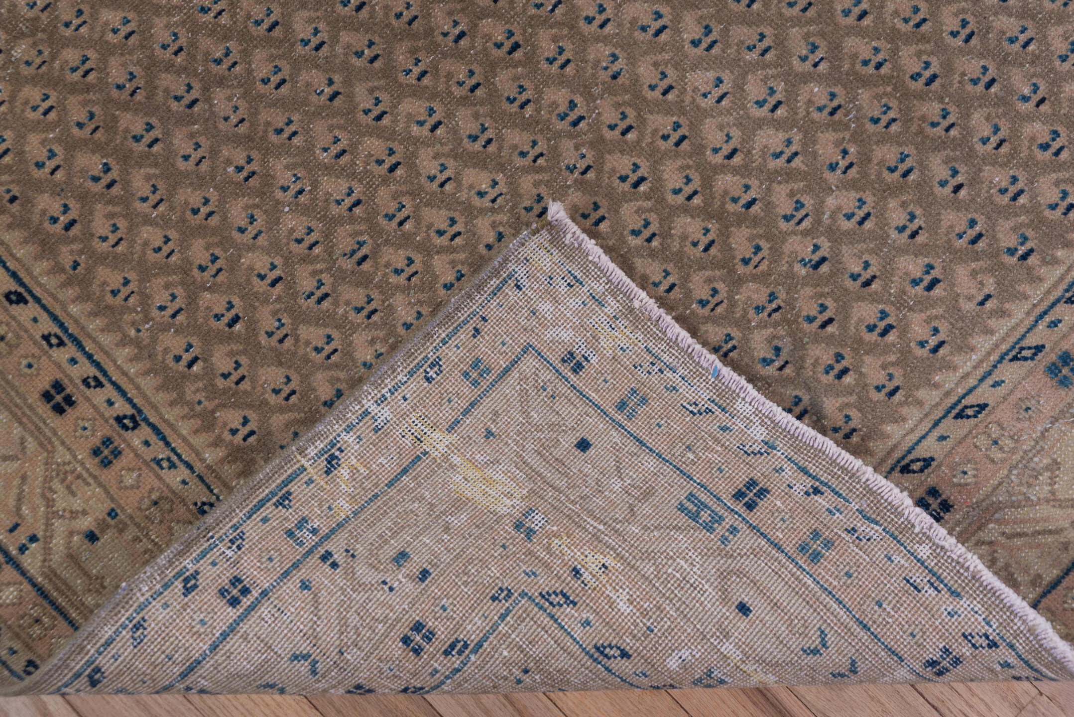 3' x 10' one-of-a-kind handmade vintage Mahal runner rug. Color palette: taupe, brown, beige, indigo, ivory, camel, gray
