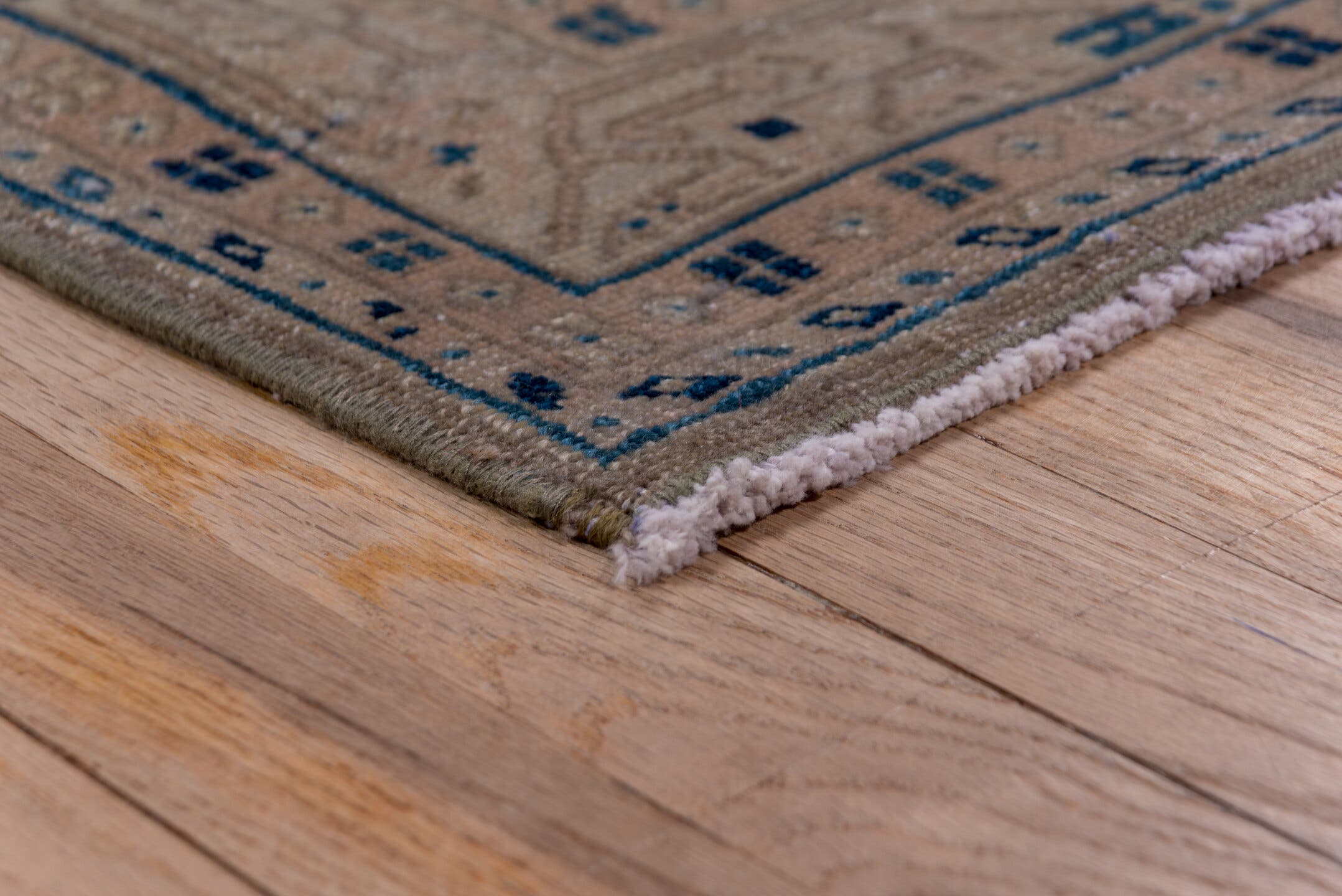 3' x 10' one-of-a-kind handmade vintage Mahal runner rug. Color palette: taupe, brown, beige, indigo, ivory, camel, gray