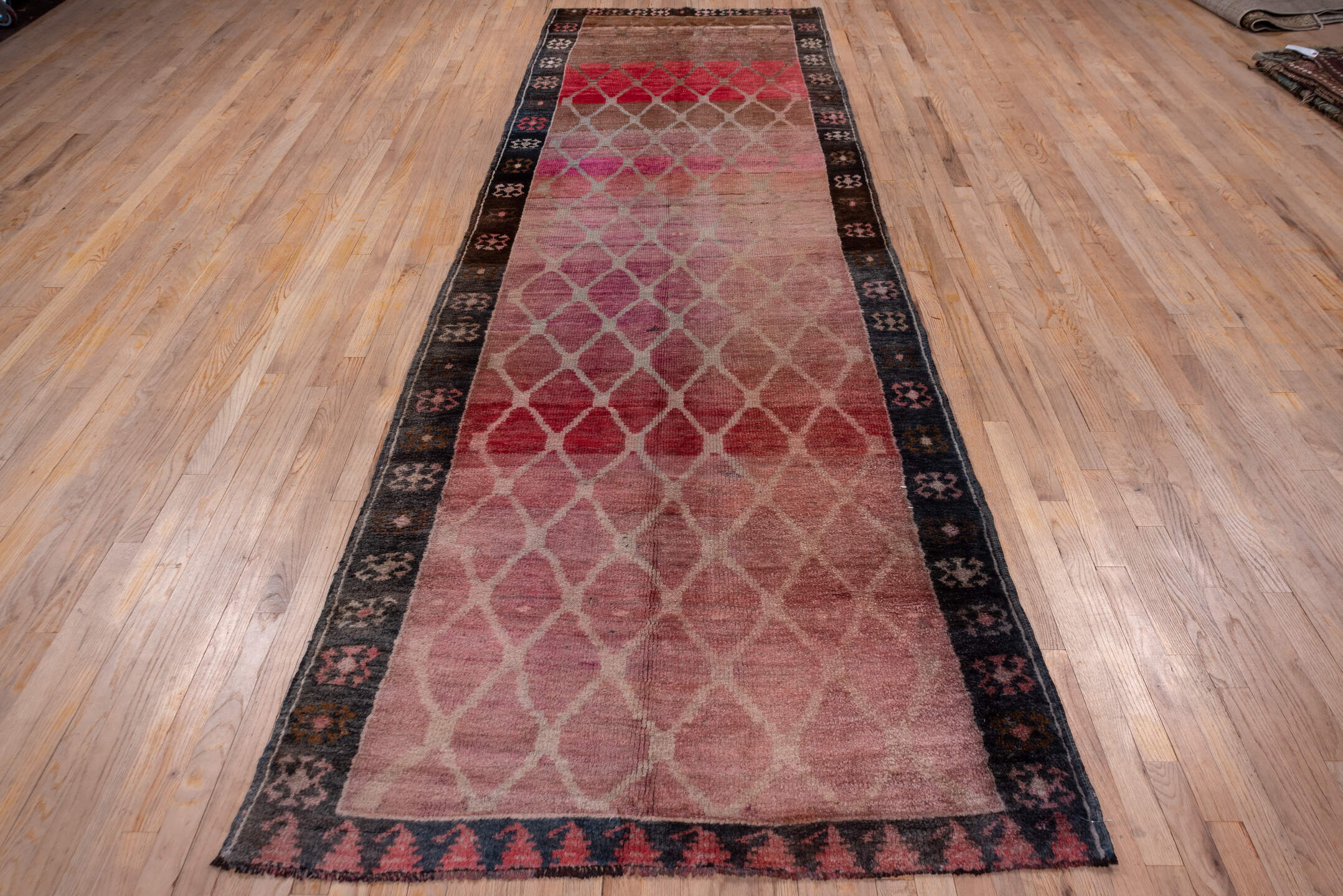 4' x 12' one-of-a-kind handmade vintage Kars runner rug. Color palette: black, blue, brown, gray, pink, red, redwood
