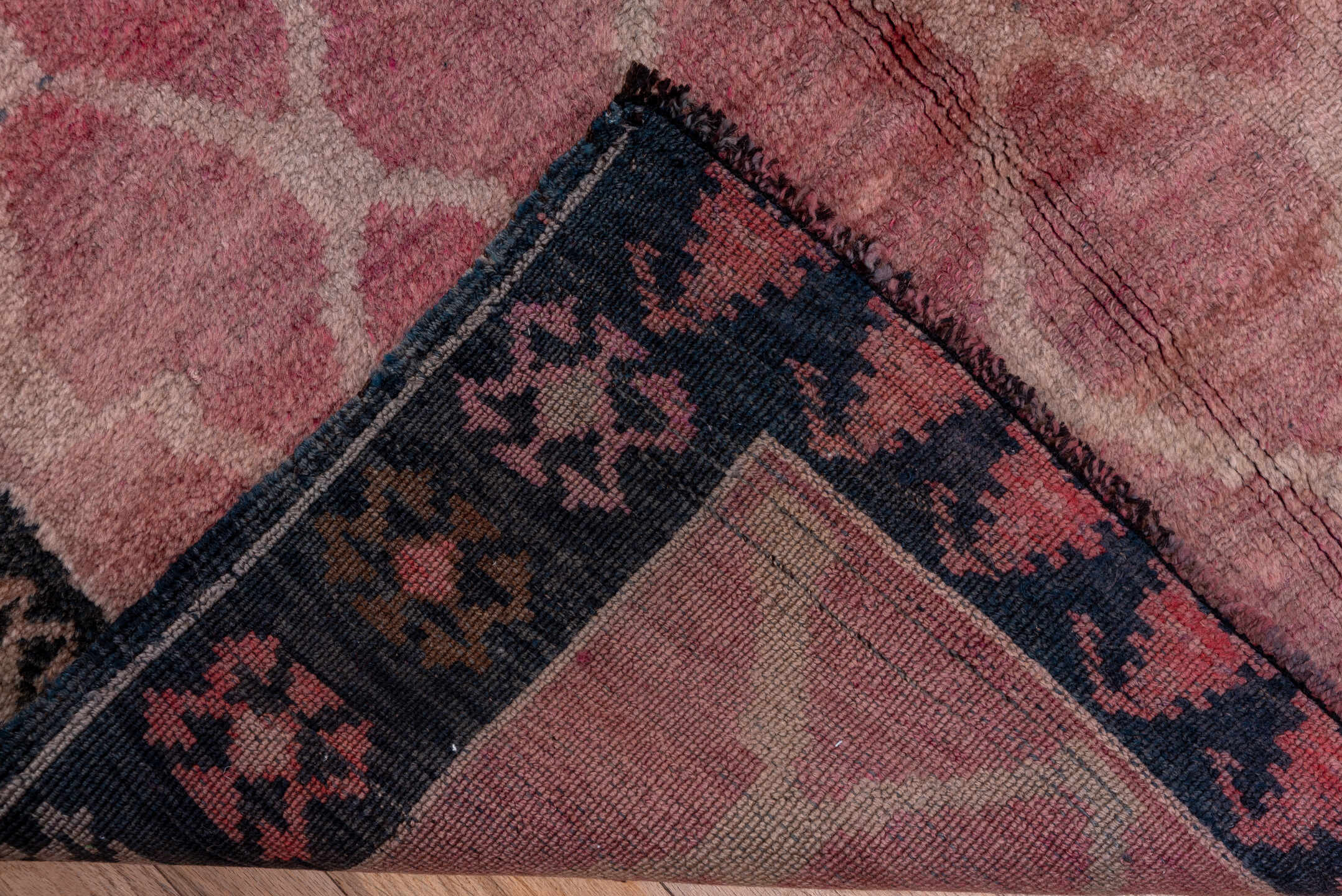 4' x 12' one-of-a-kind handmade vintage Kars runner rug. Color palette: black, blue, brown, gray, pink, red, redwood