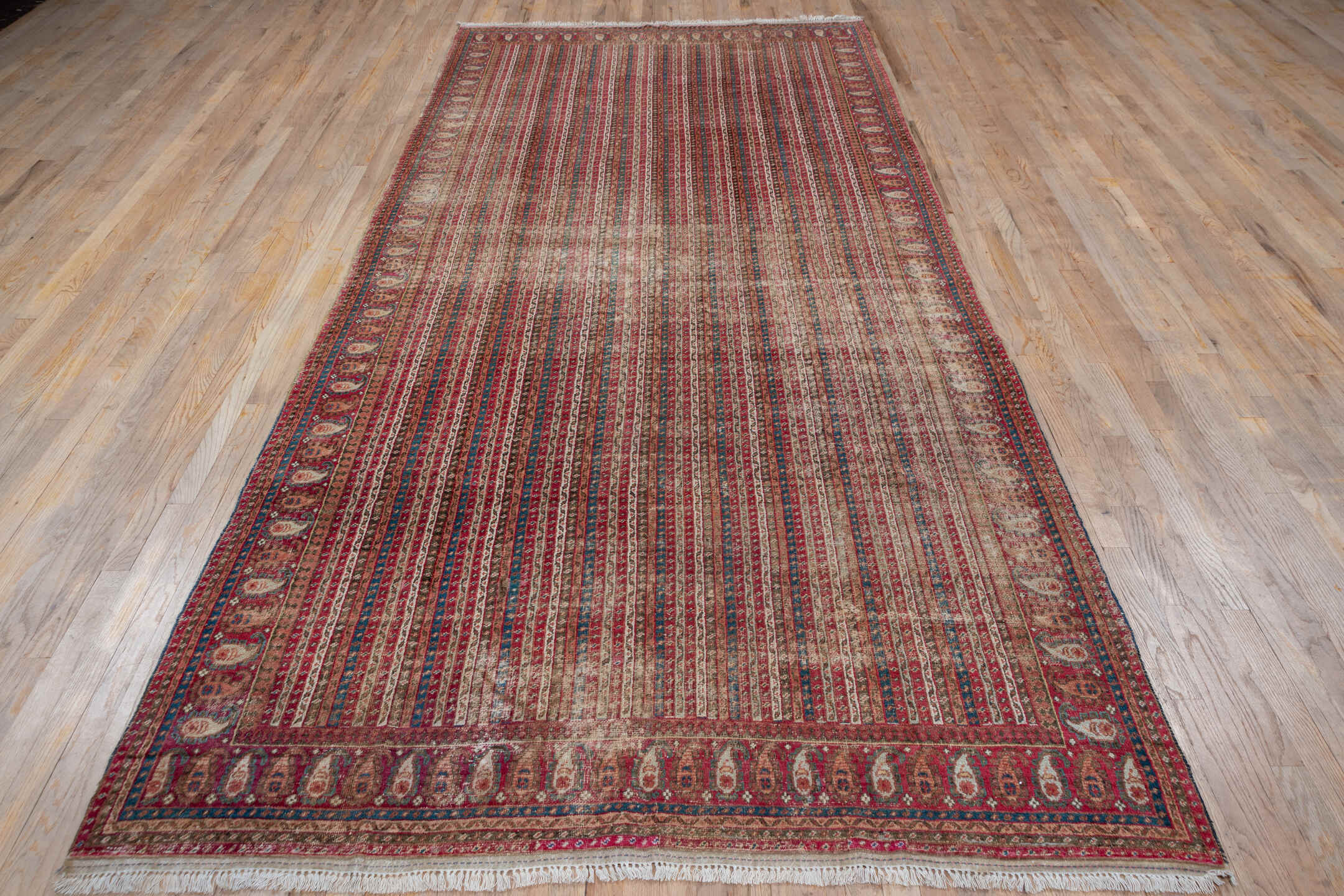 6' x 12' one-of-a-kind handmade antique Ghordes large size rug. Color palette: rust, brick, ivory, navy, rose, taupe