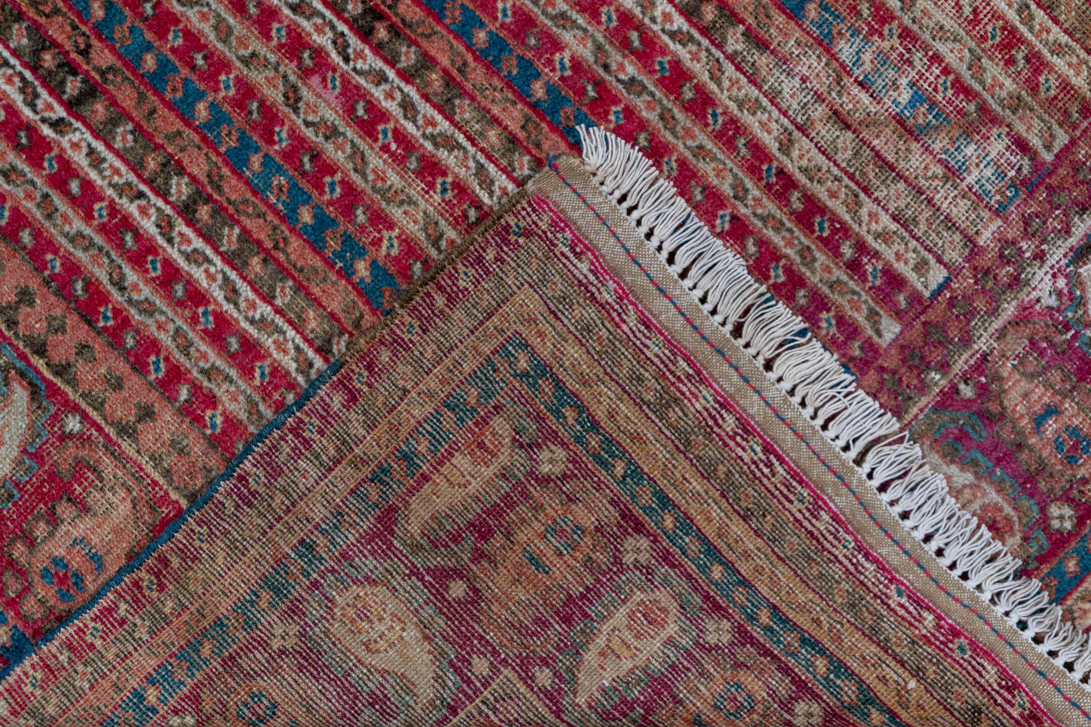 6' x 12' one-of-a-kind handmade antique Ghordes large size rug. Color palette: rust, brick, ivory, navy, rose, taupe