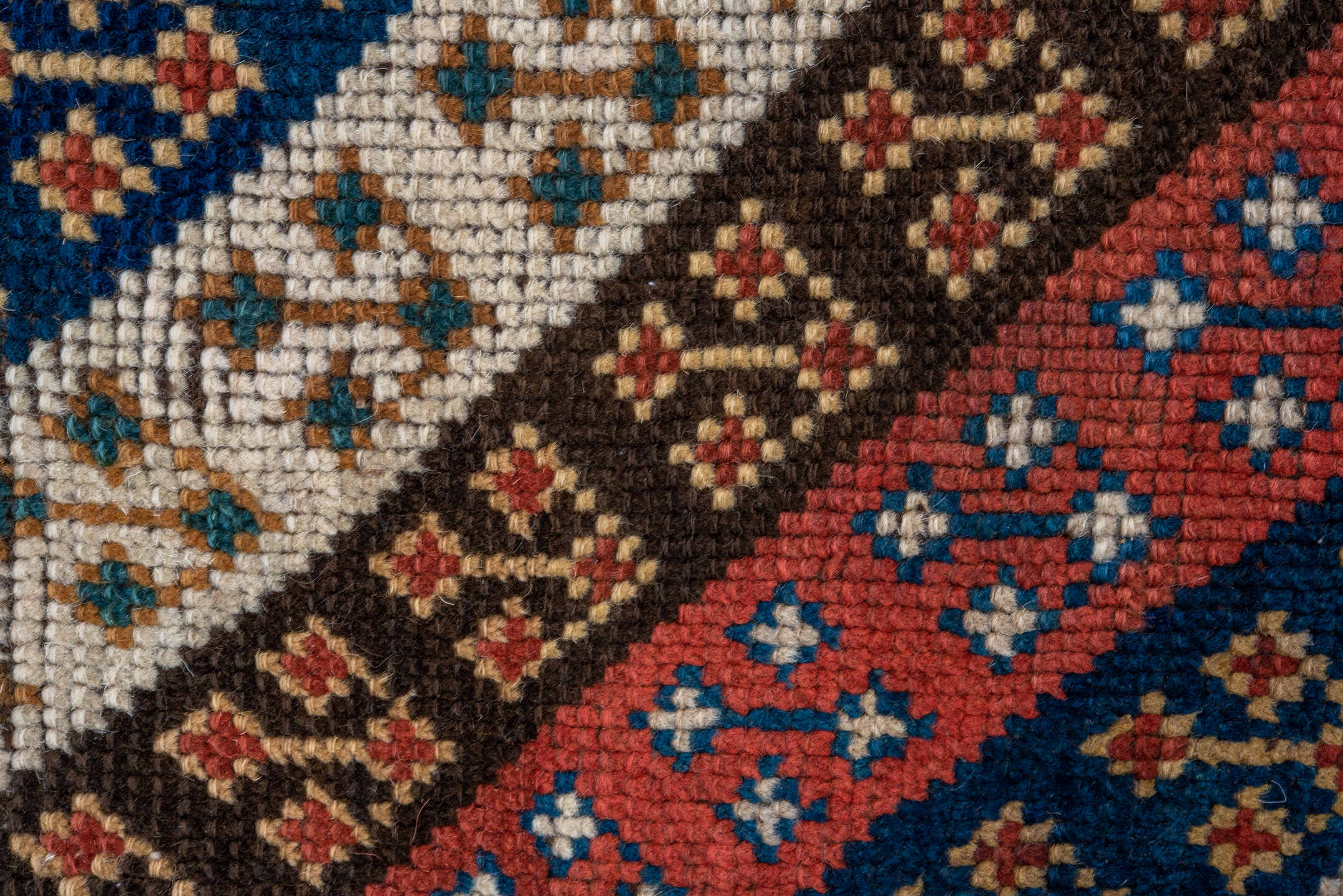 3' x 6' one-of-a-kind handmade antique Kazak small size rug. Color palette: ivory, navy, turquoise, rust, camel, terracotta
