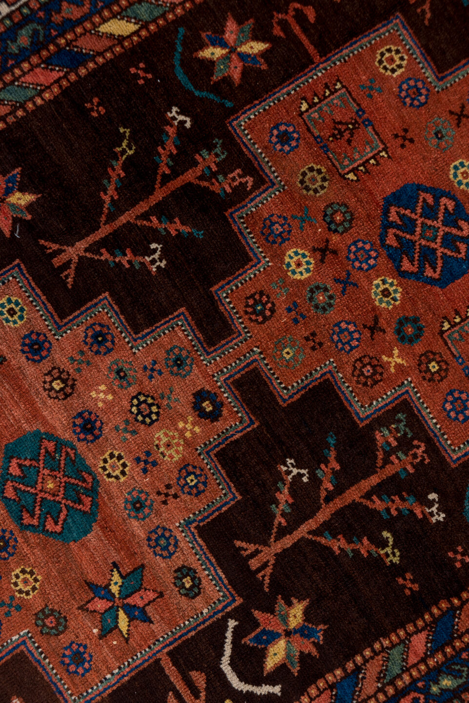 4' x 11' one-of-a-kind handmade antique Malayer runner rug. Color palette: brown, rust, ivory, navy, terra cotta, indigo