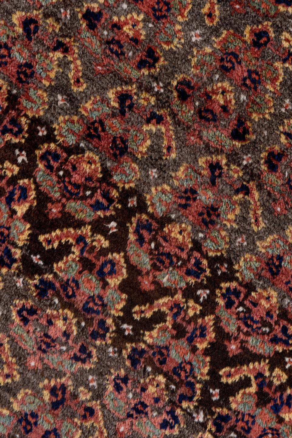 4' x 9' one-of-a-kind handmade antique Kurd rug. Color palette: rust, navy, brown, rose, ivory, gold, sage, terracotta, blue
