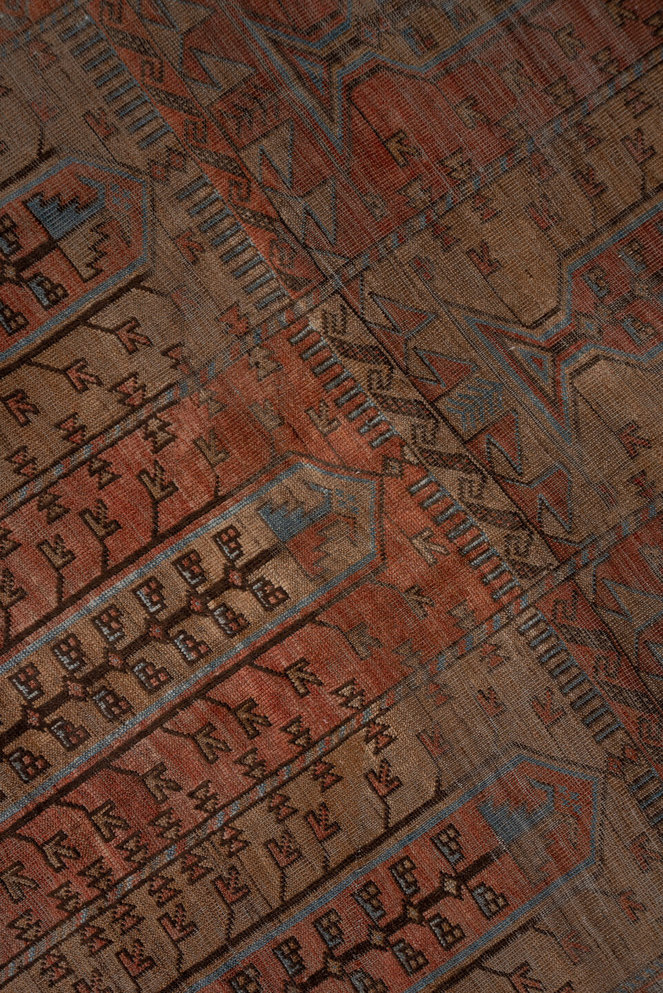 5' x 9' one-of-a-kind handmade antique Belouch large size rug. Color palette: rust, brown, slate, taupe, charcoal