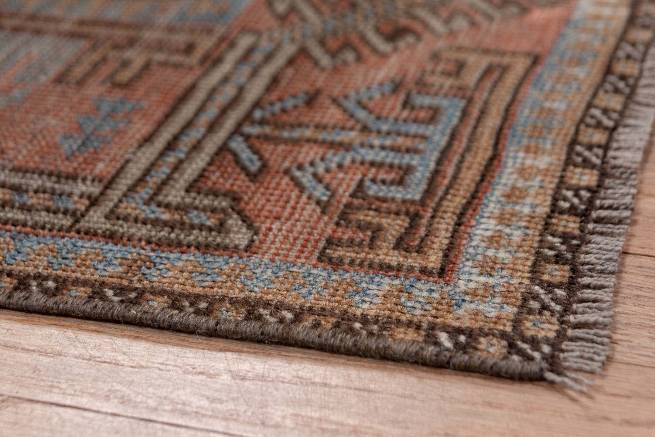 5' x 9' one-of-a-kind handmade antique Belouch large size rug. Color palette: rust, brown, slate, taupe, charcoal