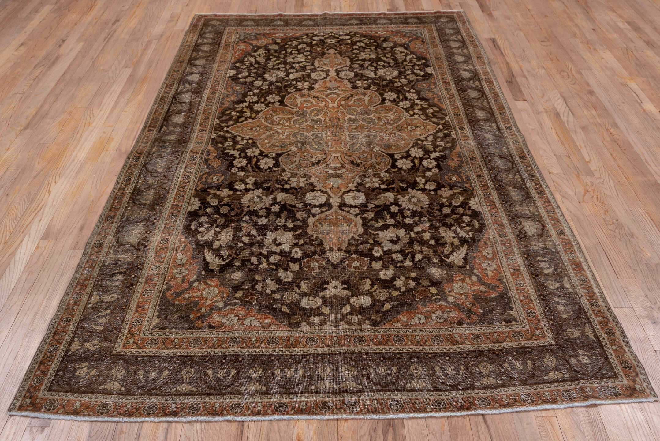 5' x 9' one-of-a-kind handmade antique Sivas medium size rug. Color palette: brown, taupe, terra cotta, ivory, charcoal