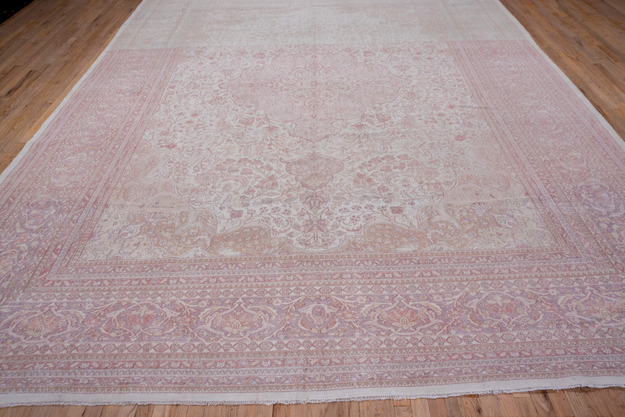 11' x 14' one-of-a-kind handmade antique Tabriz oversize rug. Color palette: ivory, blush, rose, pale lavender, taupe, peach