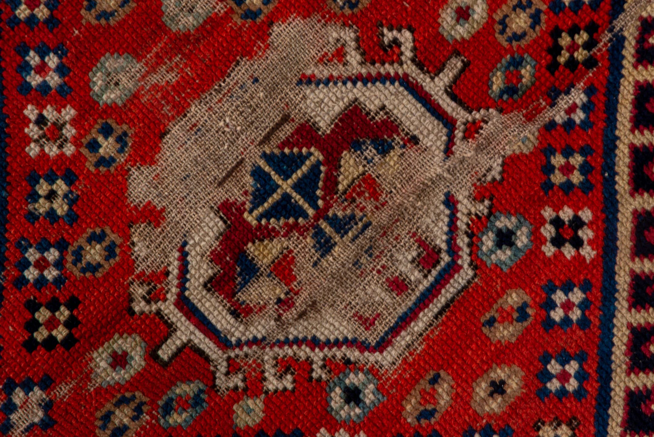 4' x 9' one-of-a-kind handmade vintage Shirvan runner rug. Color palette: navy, rust, ivory, sky blue, camel, red, slate