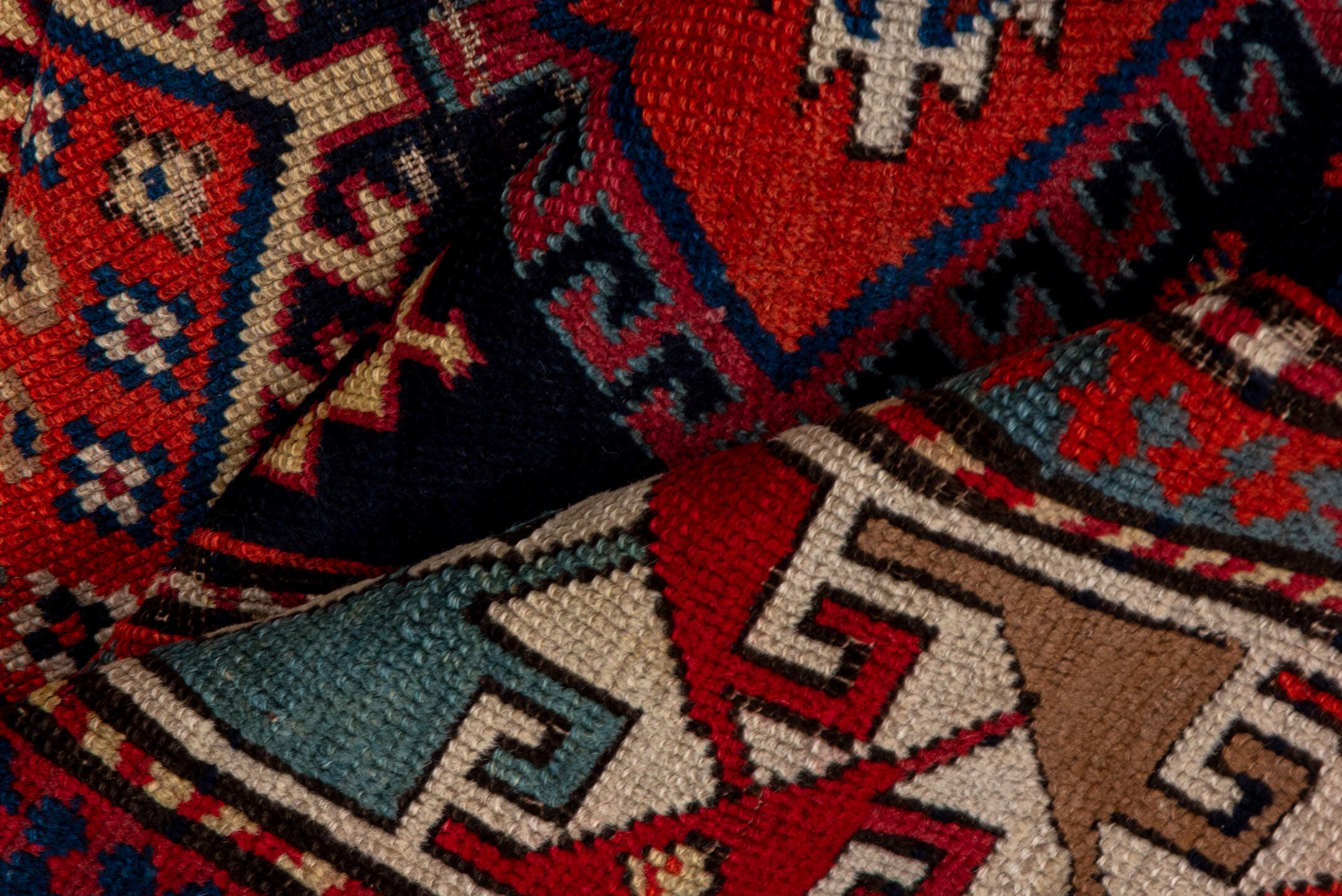 4' x 9' one-of-a-kind handmade vintage Shirvan runner rug. Color palette: navy, rust, ivory, sky blue, camel, red, slate