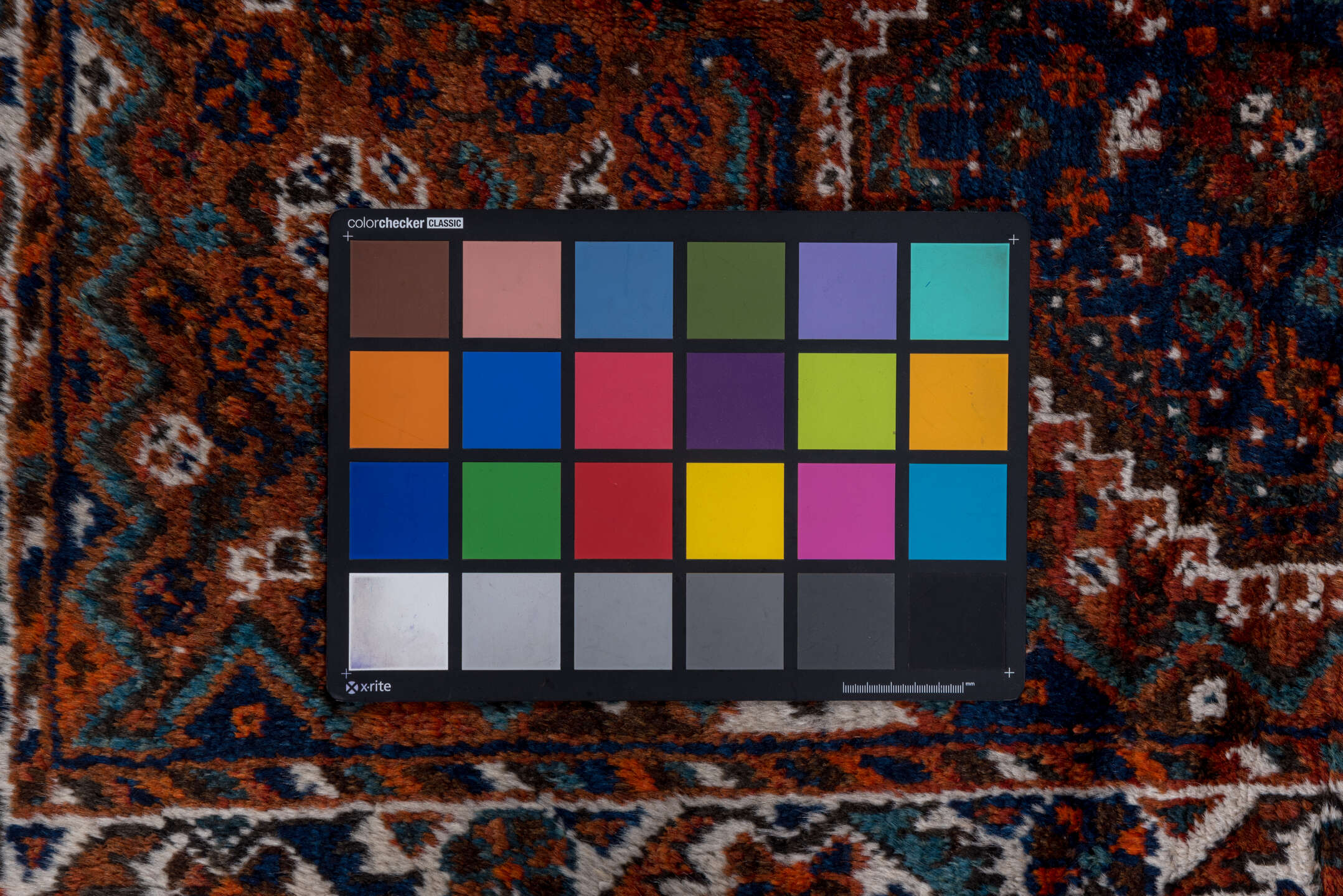 2' x 4' one-of-a-kind handmade vintage Shiraz small size rug. Color palette: black, blue, brown, gray, light gray, off-white