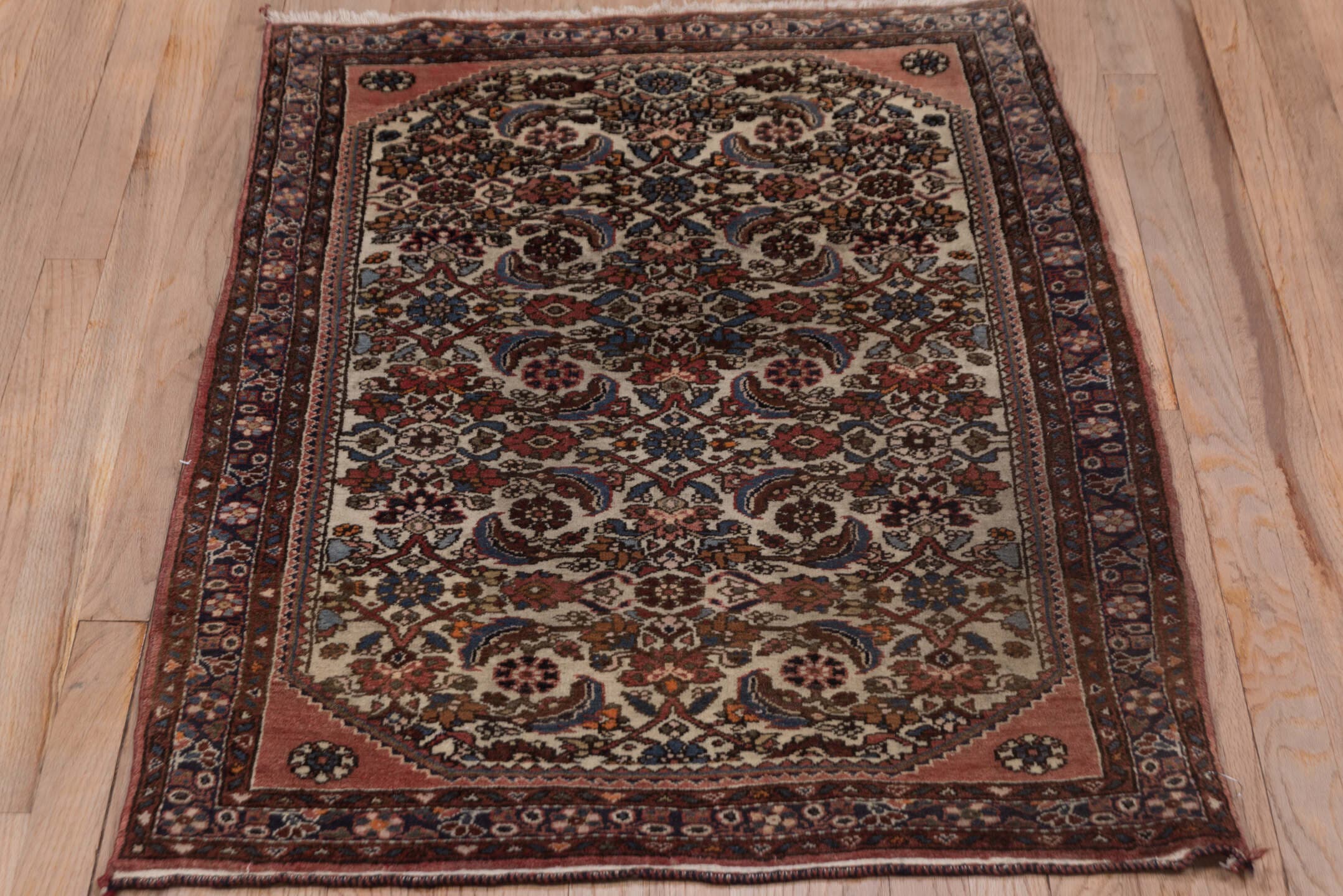 2' x 4' one-of-a-kind handmade antique Malayer small size rug. Color palette: ivory, rose, rust, indigo, soft blue, burgundy