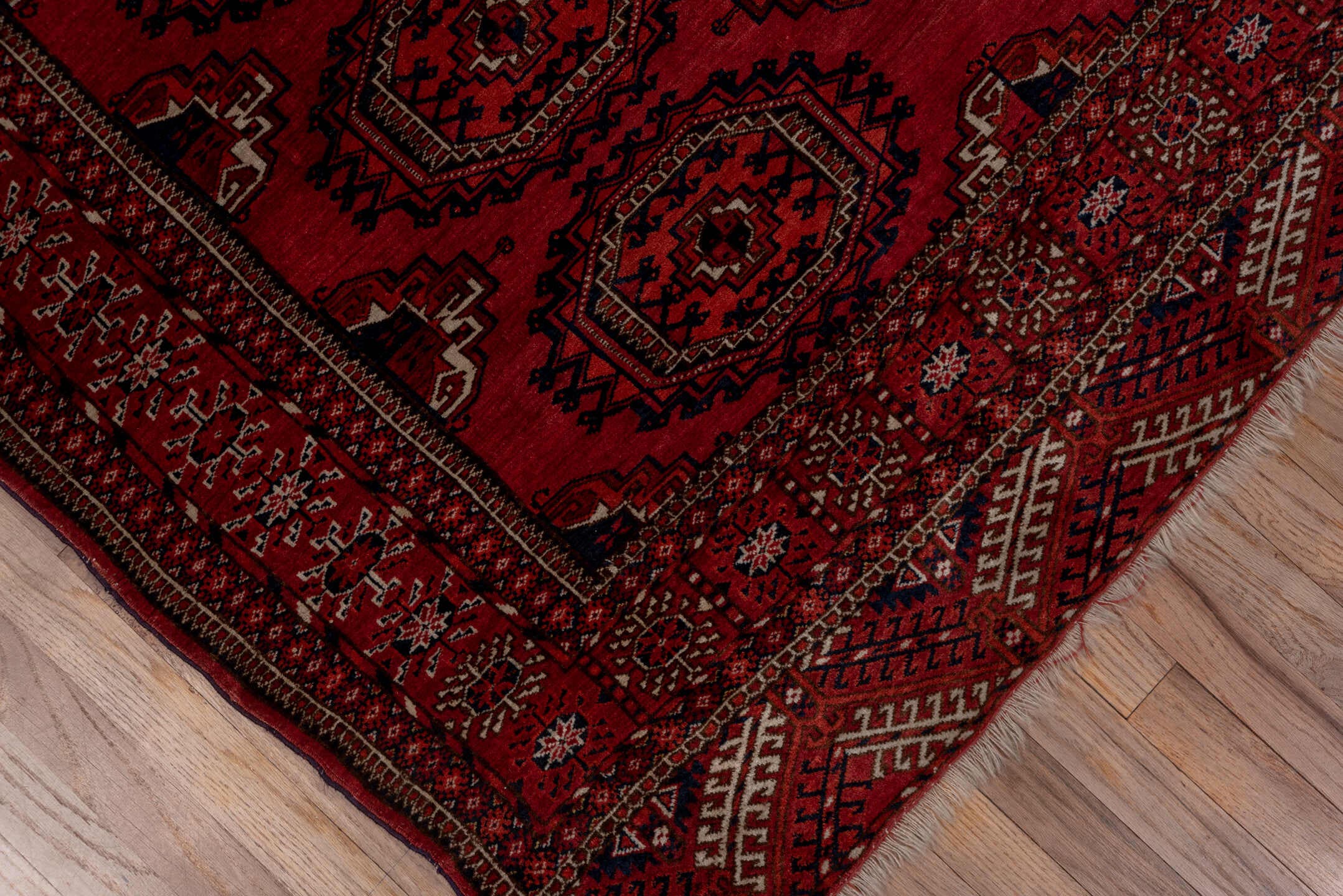4' x 5' one-of-a-kind handmade antique Torkaman rug. Color palette: crimson, burgundy, rust, ivory, navy, charcoal, rose