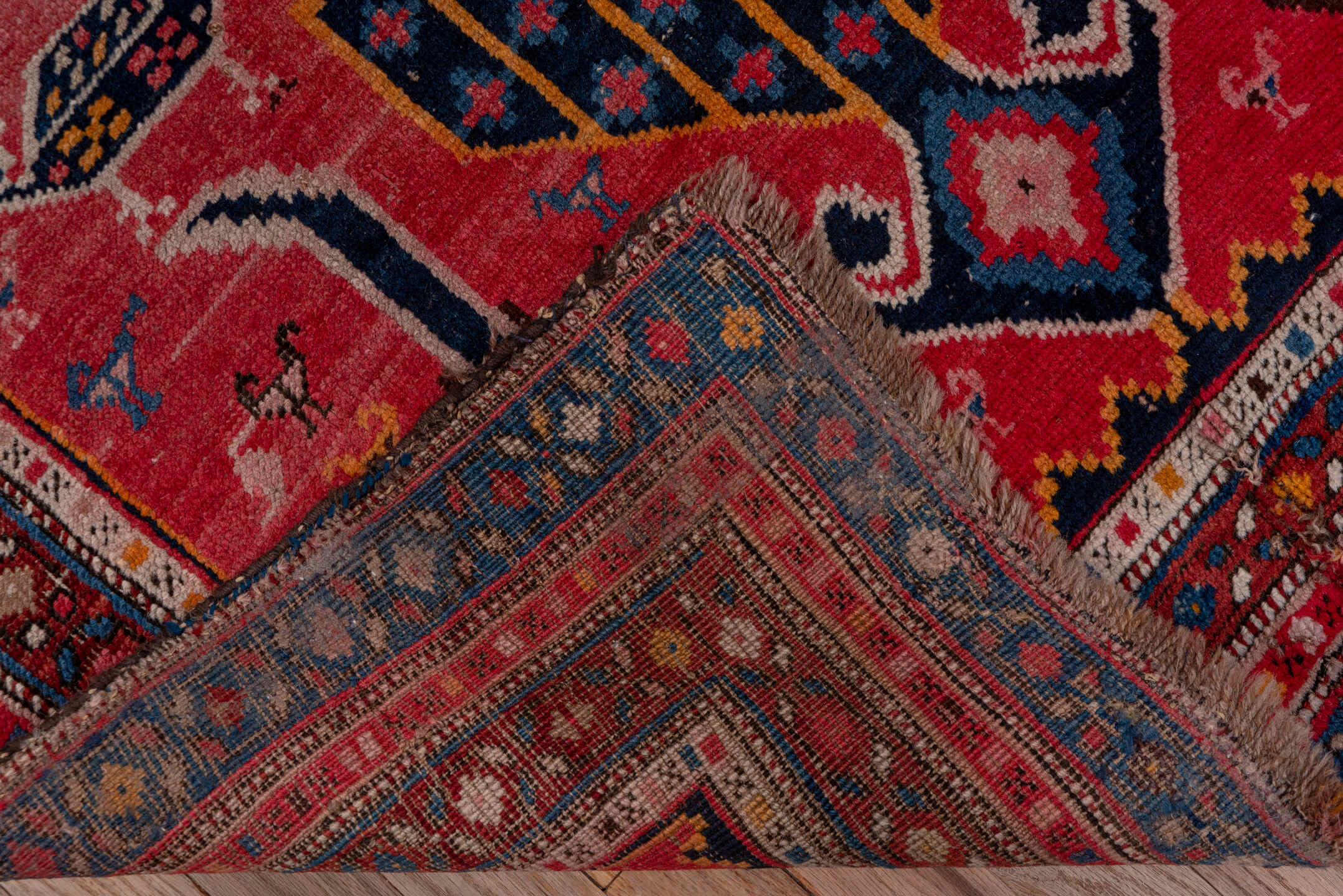 3' x 8' one-of-a-kind handmade antique Karabagh runner rug. Color palette: rose, indigo, crimson, ivory, navy, gold, coral