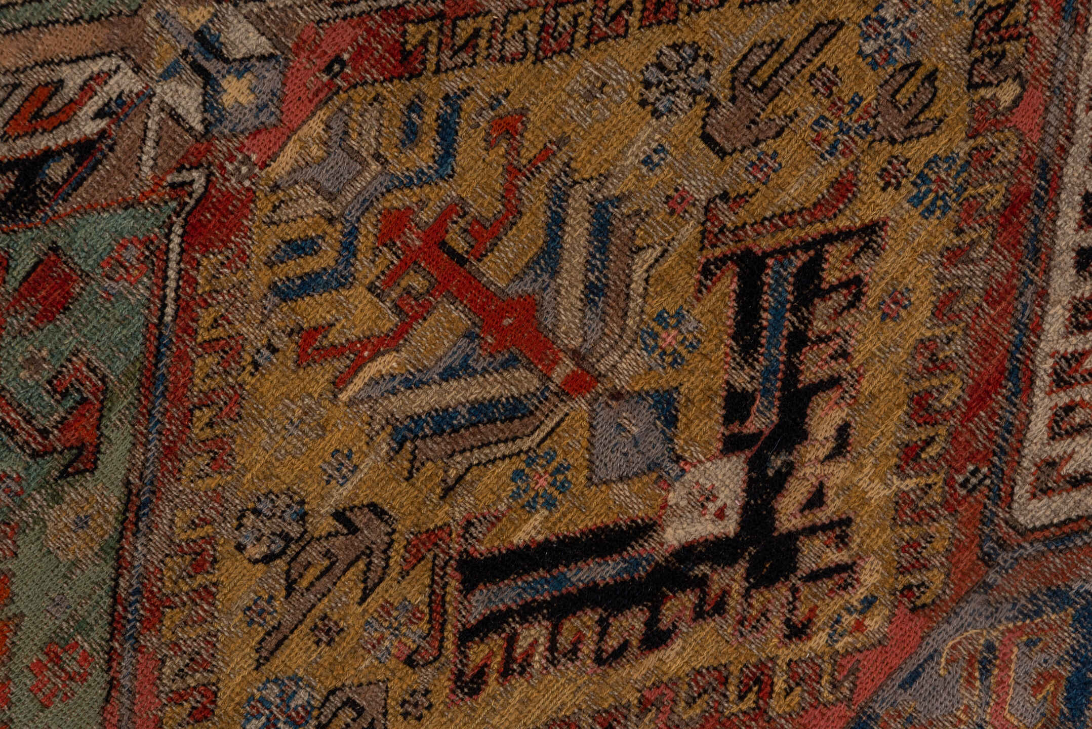 6' x 10' one-of-a-kind handmade antique Sumak large size rug. Color palette: rust, indigo, ivory, camel, aqua, charcoal