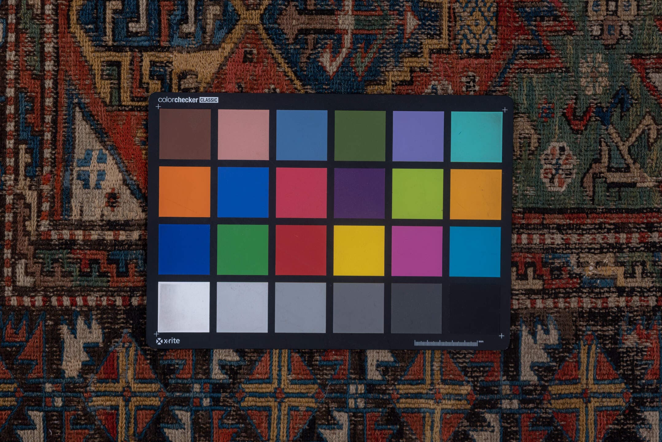 6' x 10' one-of-a-kind handmade antique Sumak large size rug. Color palette: rust, indigo, ivory, camel, aqua, charcoal