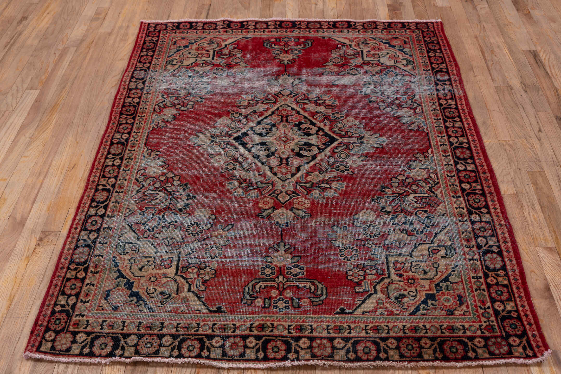 4' x 6' one-of-a-kind handmade vintage Mahal small size rug. Color palette: terracotta, navy, ivory, rose, slate, charcoal