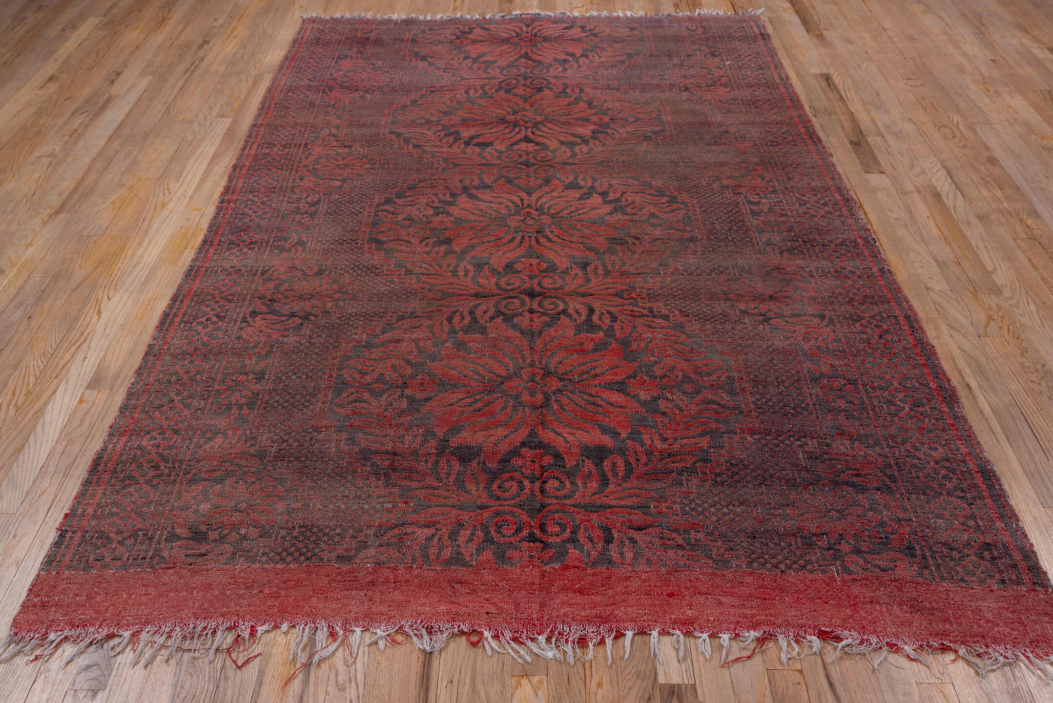 5' x 9' one-of-a-kind handmade antique Kilim medium size rug. Color palette: rust, charcoal, burgundy, mahogany, rose