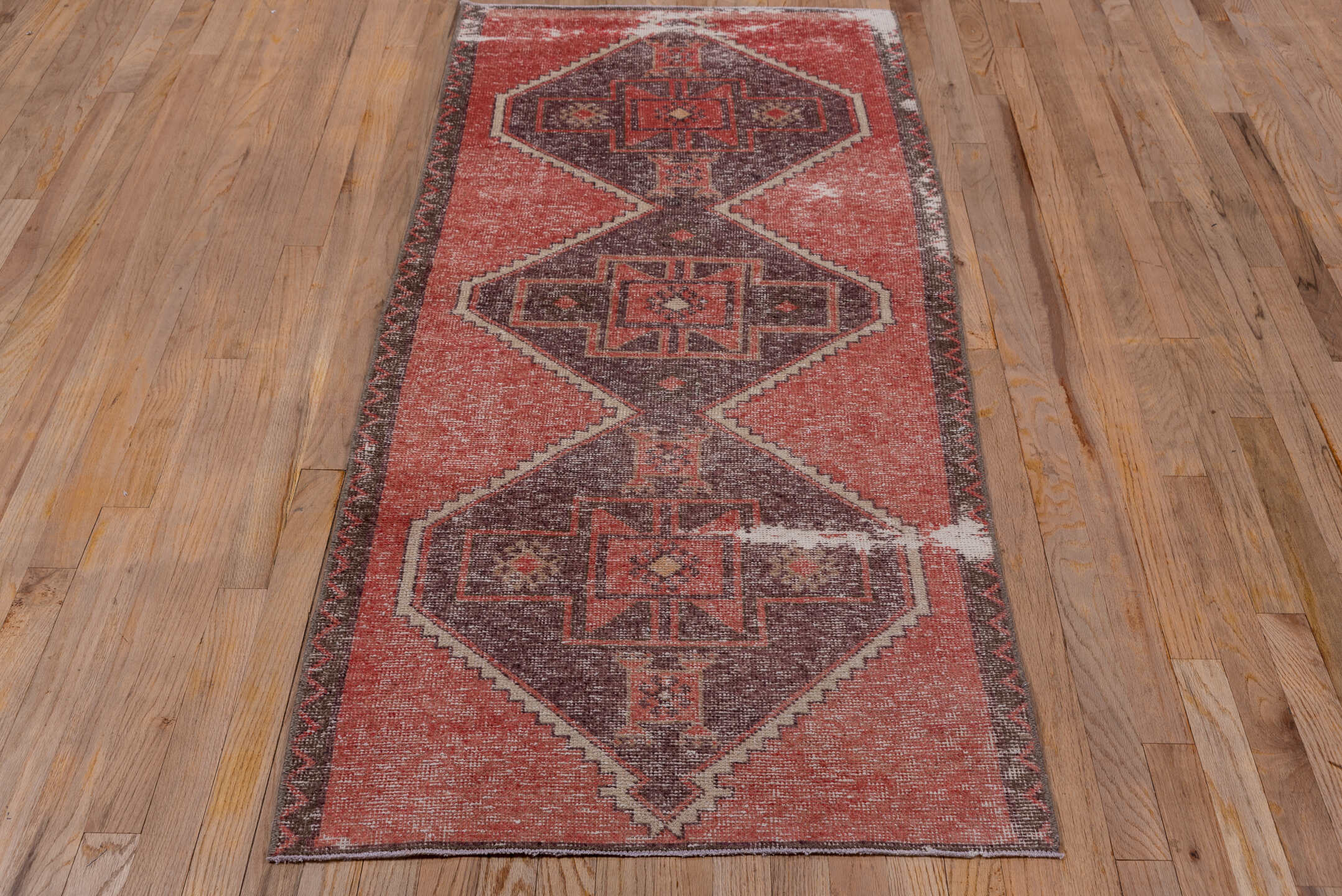 2' x 6' one-of-a-kind handmade vintage Oushak runner rug. Color palette: brown, gray, light gray, pink, red, wine