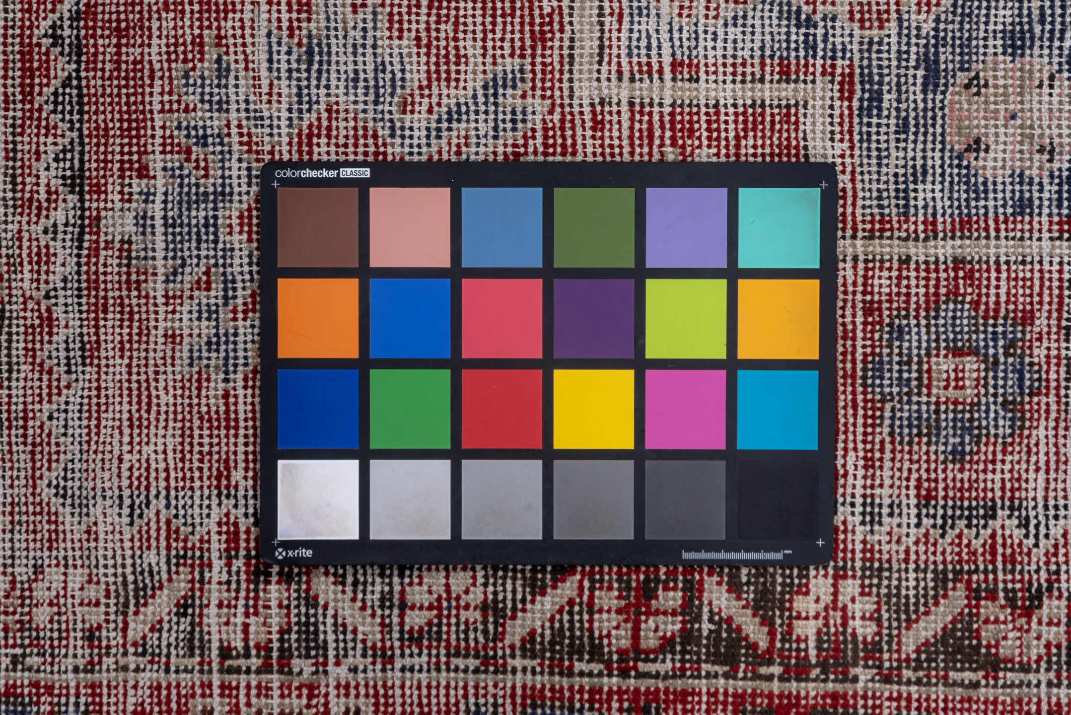 4' x 9' one-of-a-kind handmade vintage Oushak rug. Color palette: burgundy, dusty blue, rose, ivory, charcoal, taupe, blue