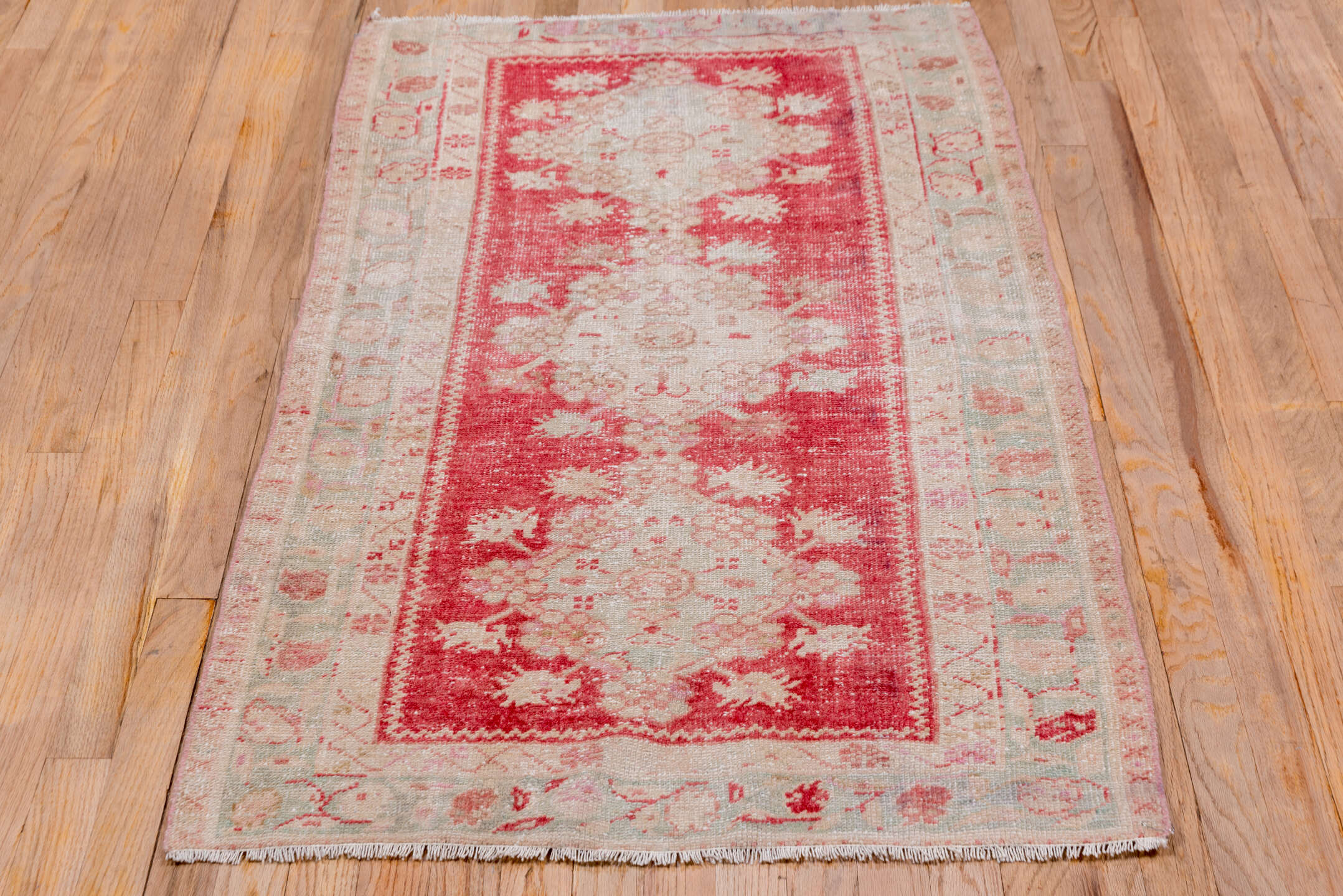 2' x 5' one-of-a-kind handmade vintage Oushak small size rug. Color palette: coral, ivory, pale blue, blush, rose, beige