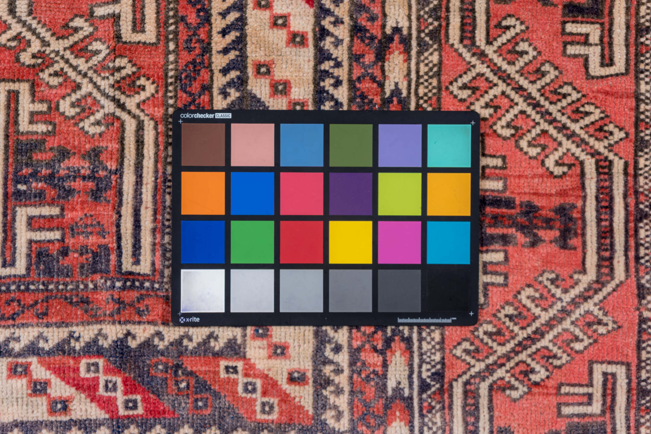 3' x 5' one-of-a-kind handmade vintage Oushak small size rug. Color palette: black, blue, brown, gray, off-white, pink, red