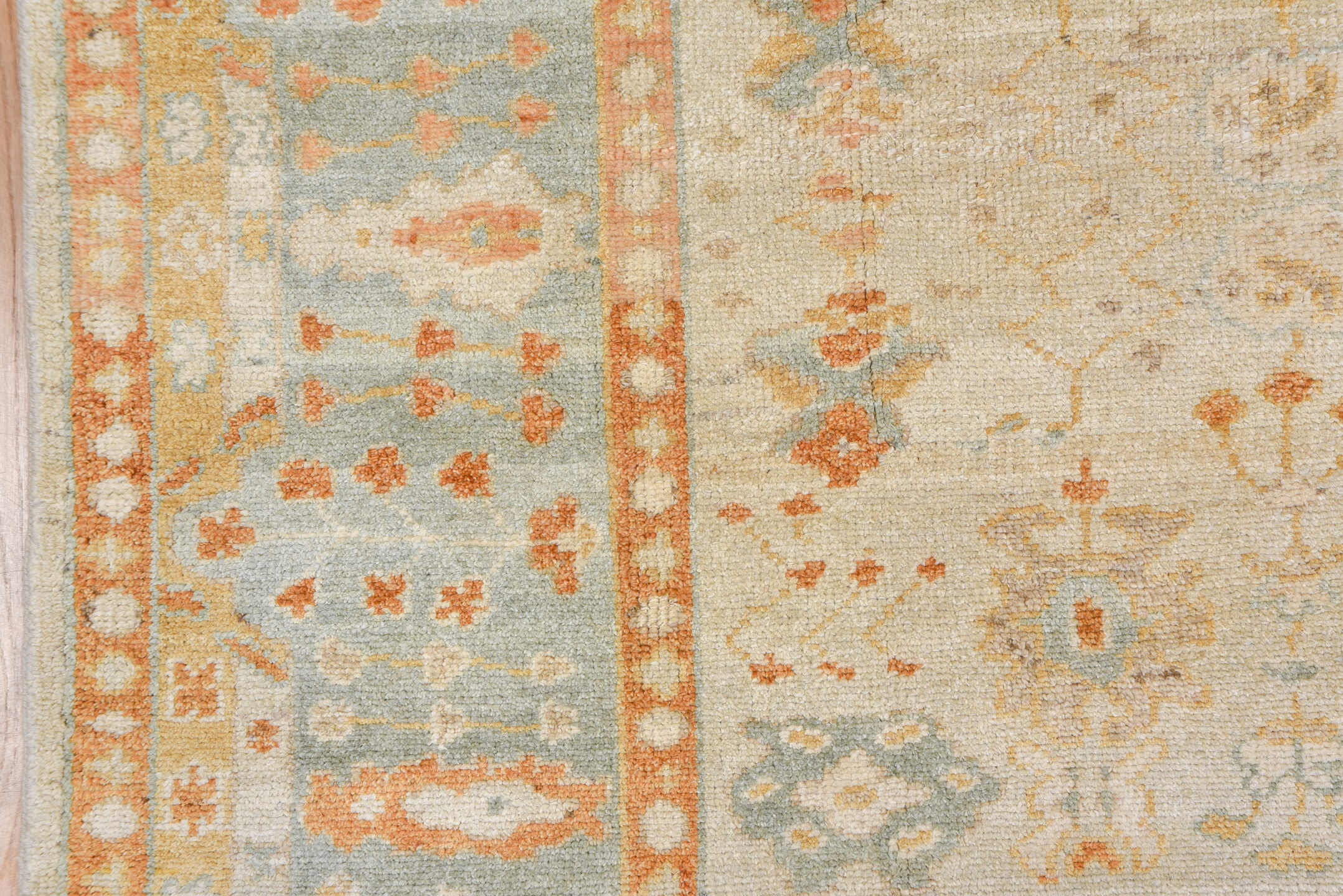 8' x 9' one-of-a-kind handmade vintage Oushak rug. Color palette: ivory, pale blue, gold, sand, taupe, terra cotta