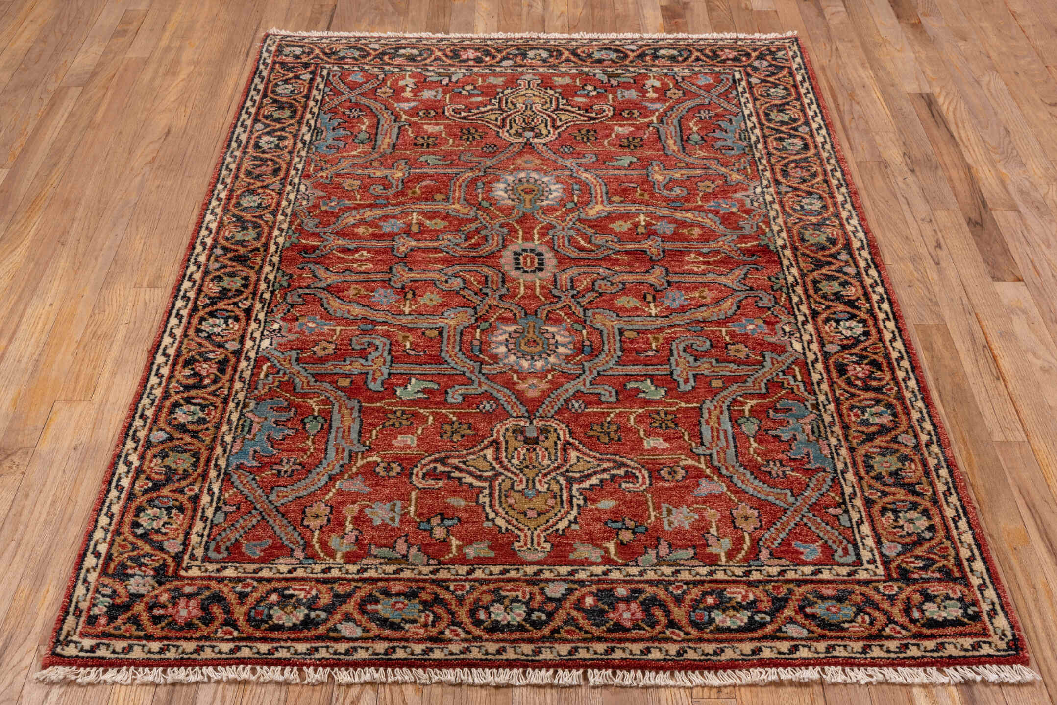 4' x 6' one-of-a-kind handmade vintage Heriz small size rug. Color palette: rust, ivory, navy, sky_blue, sage, charcoal