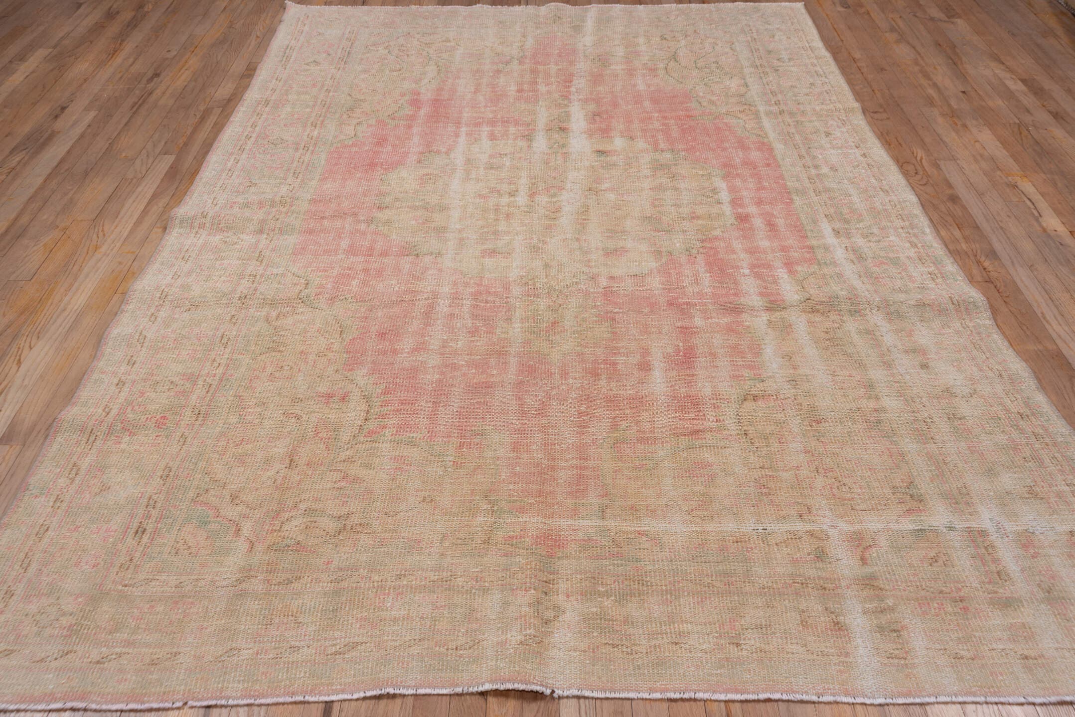 6' x 10' one-of-a-kind handmade vintage Oushak large size rug. Color palette: ivory, blush, cream, pale peach, sage, taupe
