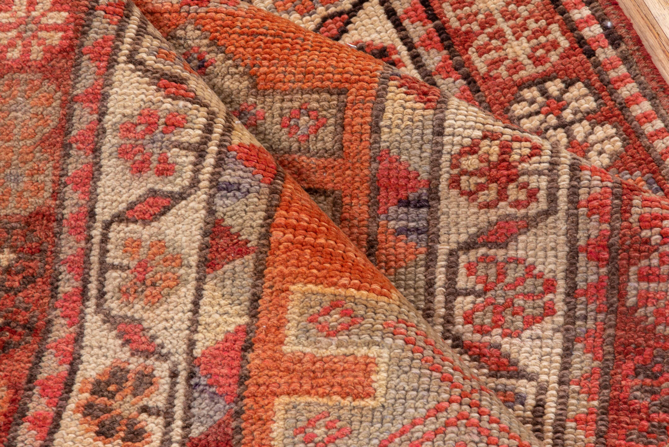 2' x 12' one-of-a-kind handmade vintage Oushak runner rug. Color palette: brown, pink, red, redwood