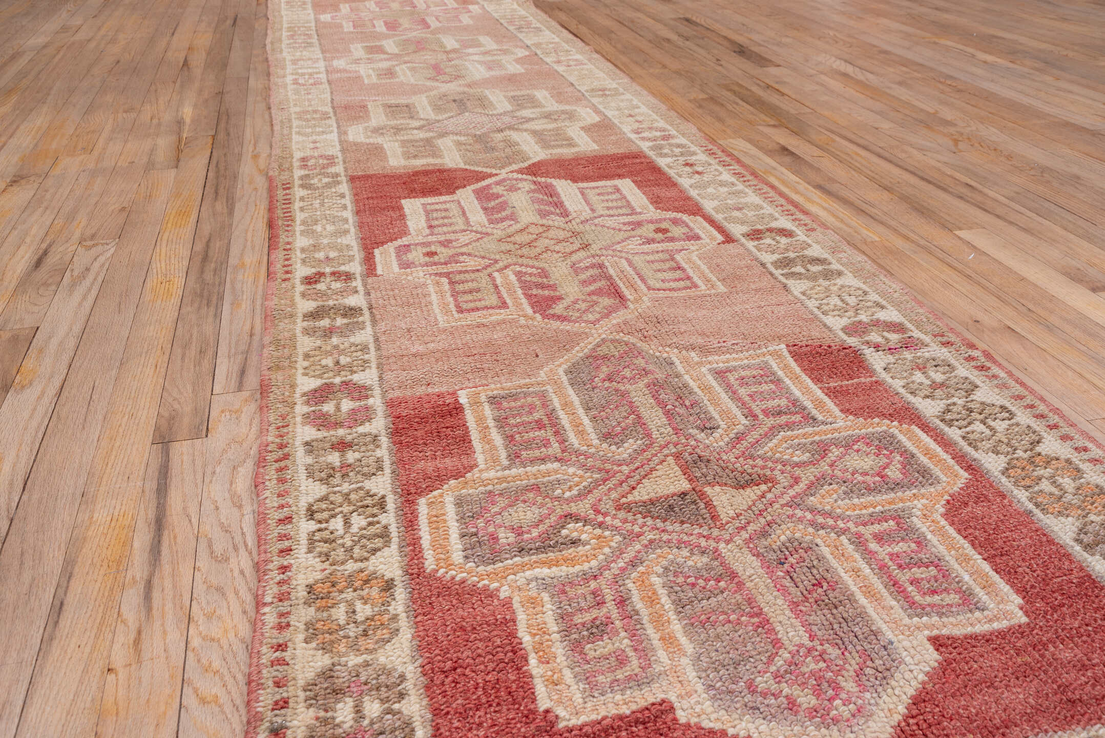 2' x 12' one-of-a-kind handmade vintage Oushak runner rug. Color palette: rose, ivory, blush, taupe, terra cotta, pink, red