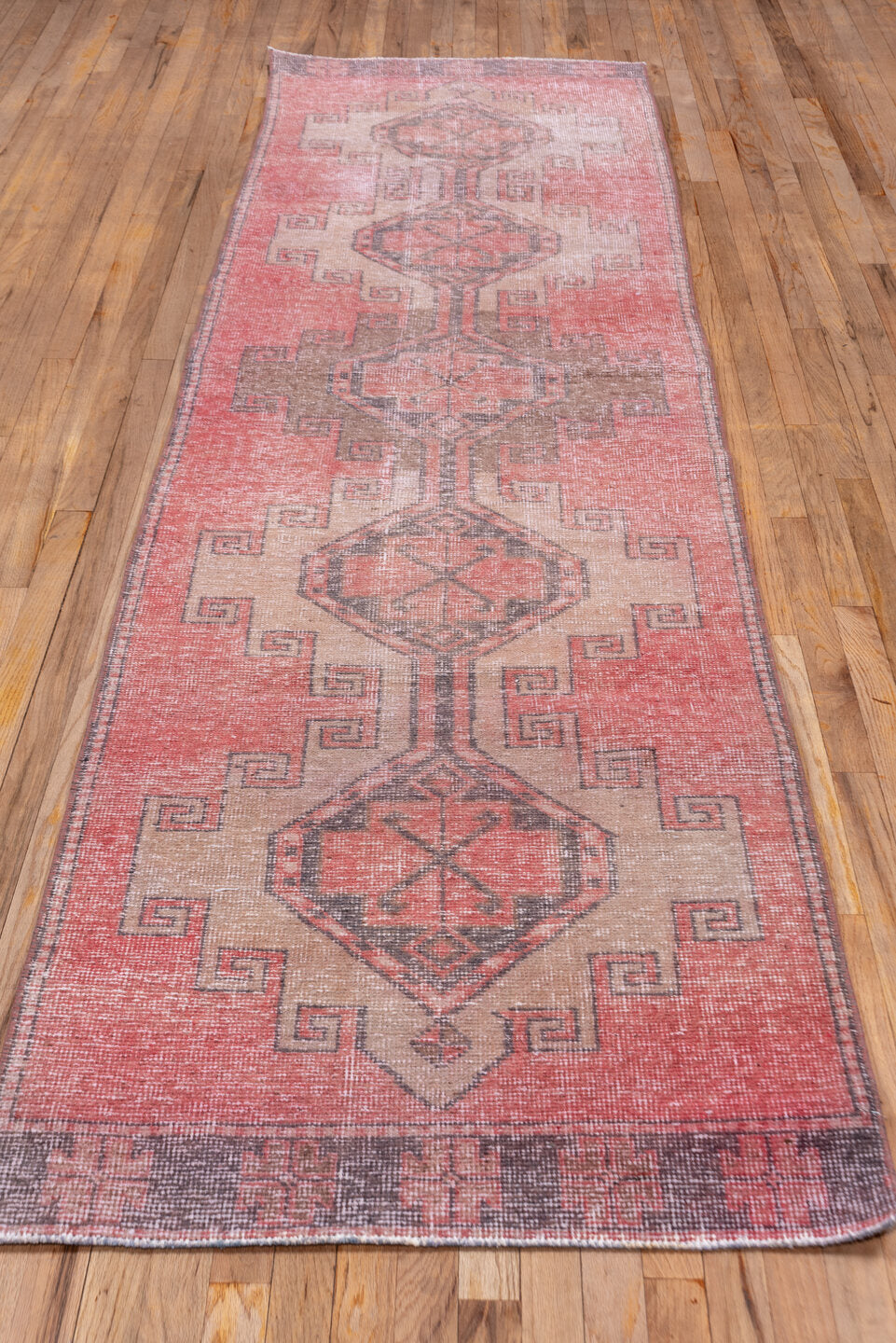 3' x 11' one-of-a-kind handmade vintage Oushak runner rug. Color palette: gray, light gray, off-white, pink, red, rosy brown