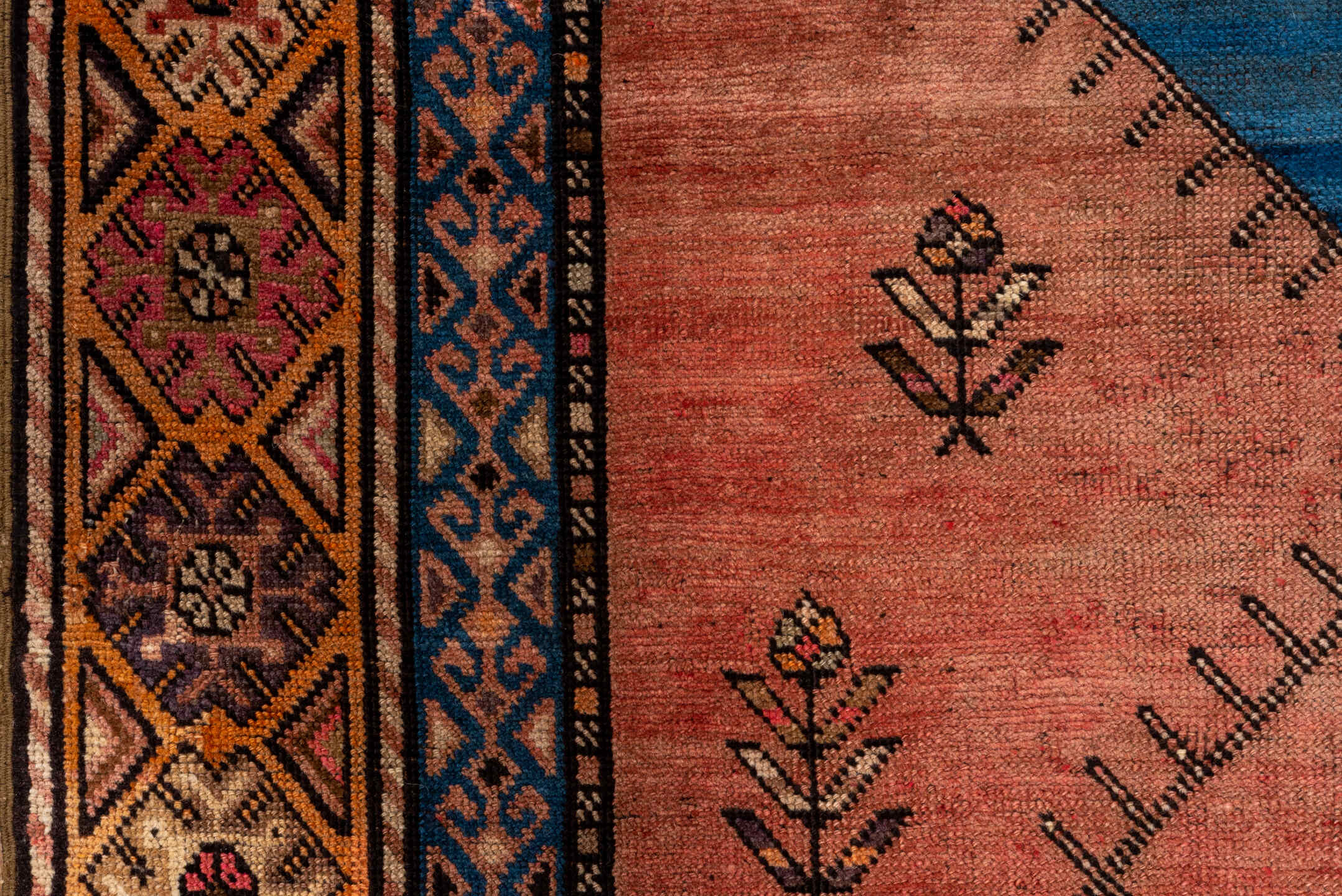 4' x 12' one-of-a-kind handmade vintage Oushak runner rug. Color palette: black, blue, brown, gray, pink, red