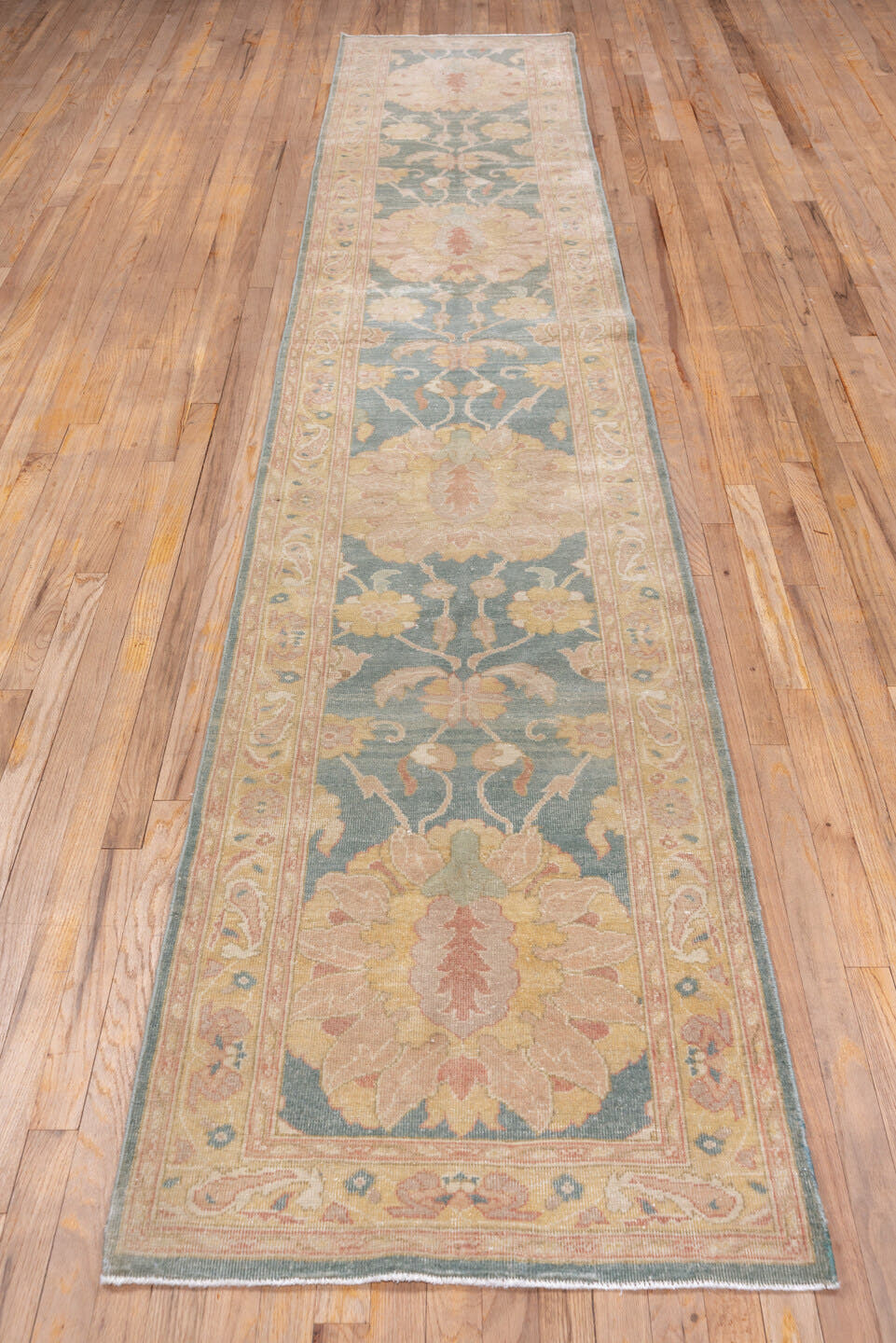 2' x 13' one-of-a-kind handmade vintage Mahal runner rug. Color palette: sage, blush, ivory, peach, taupe, rose, gold, green