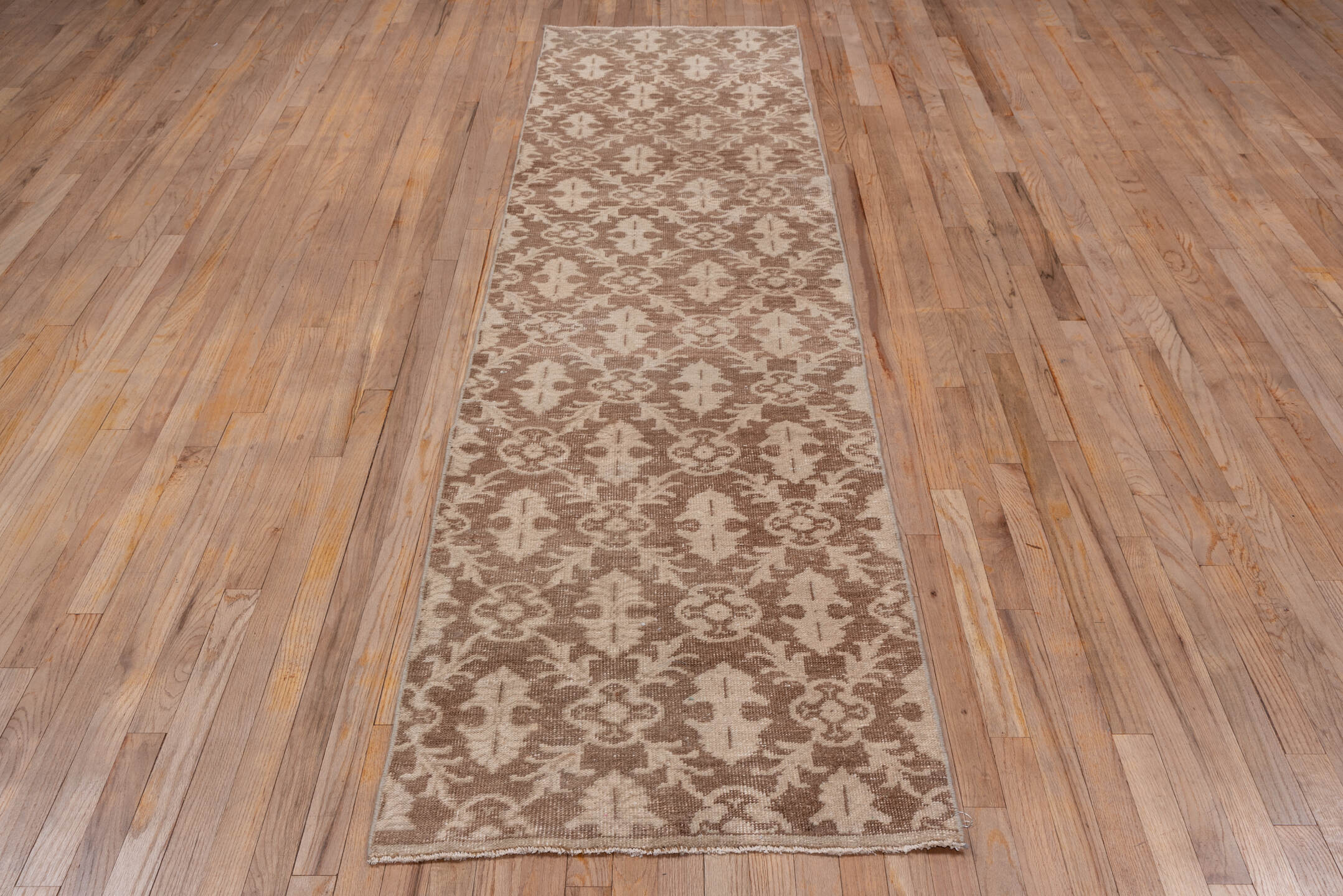 2' x 10' one-of-a-kind handmade vintage Oushak runner rug. Color palette: brown, gray, light gray, off-white, pink, snow