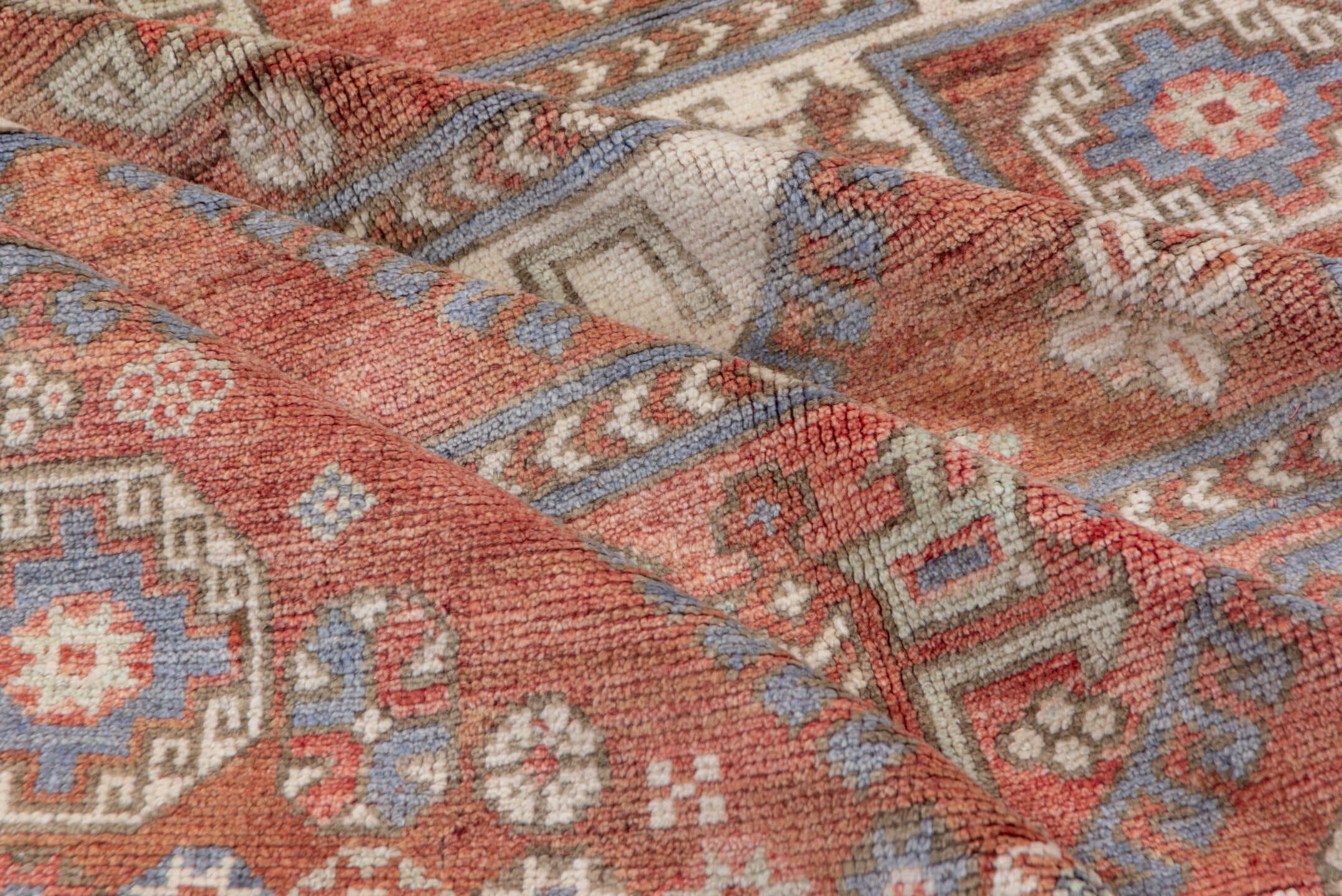 5' x 8' one-of-a-kind handmade vintage Oushak medium size rug. Color palette: terra cotta, ivory, dusty blue, rust, taupe