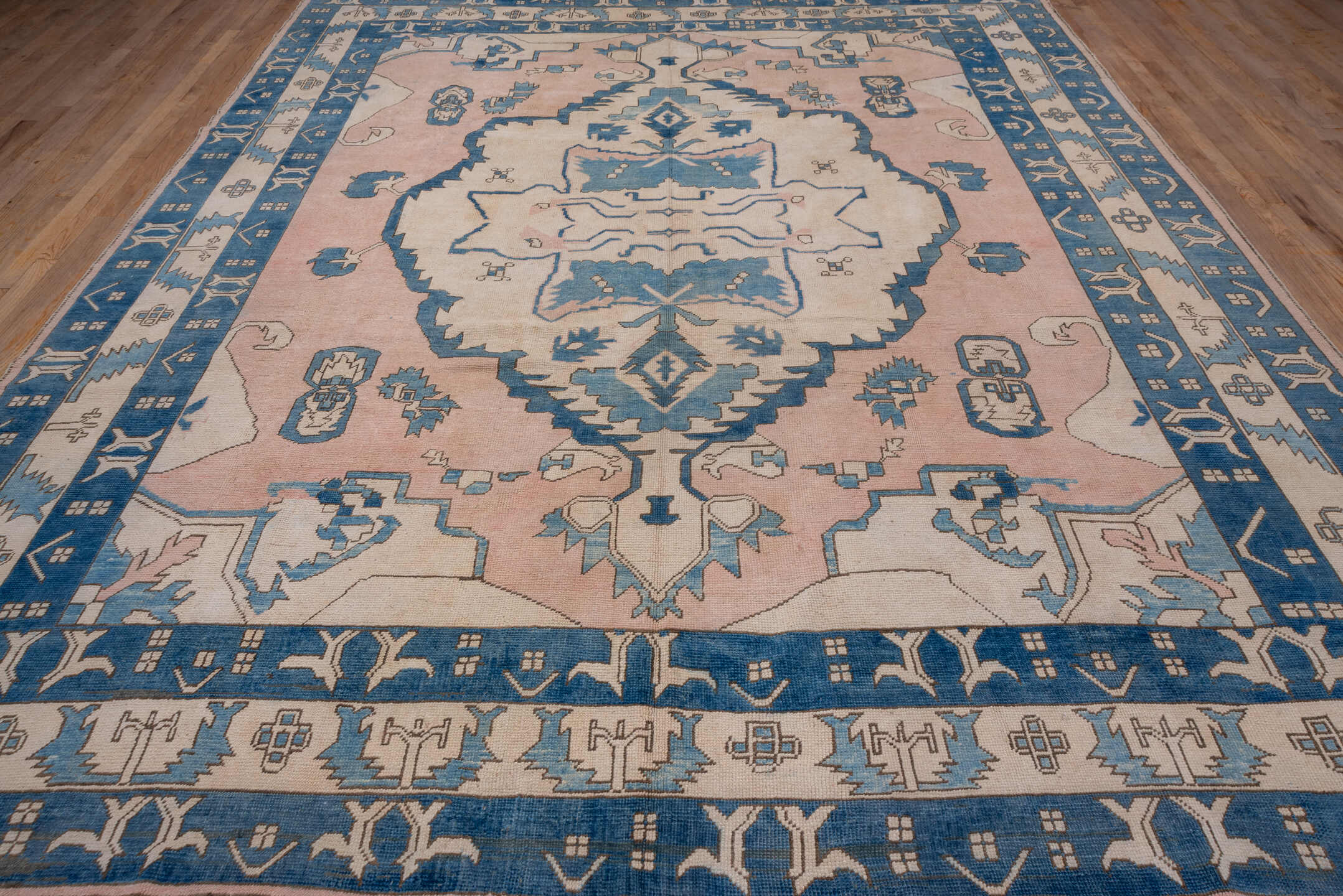 10' x 12' one-of-a-kind handmade vintage Oushak large size rug. Color palette: ivory, sky blue, blush, taupe, camel