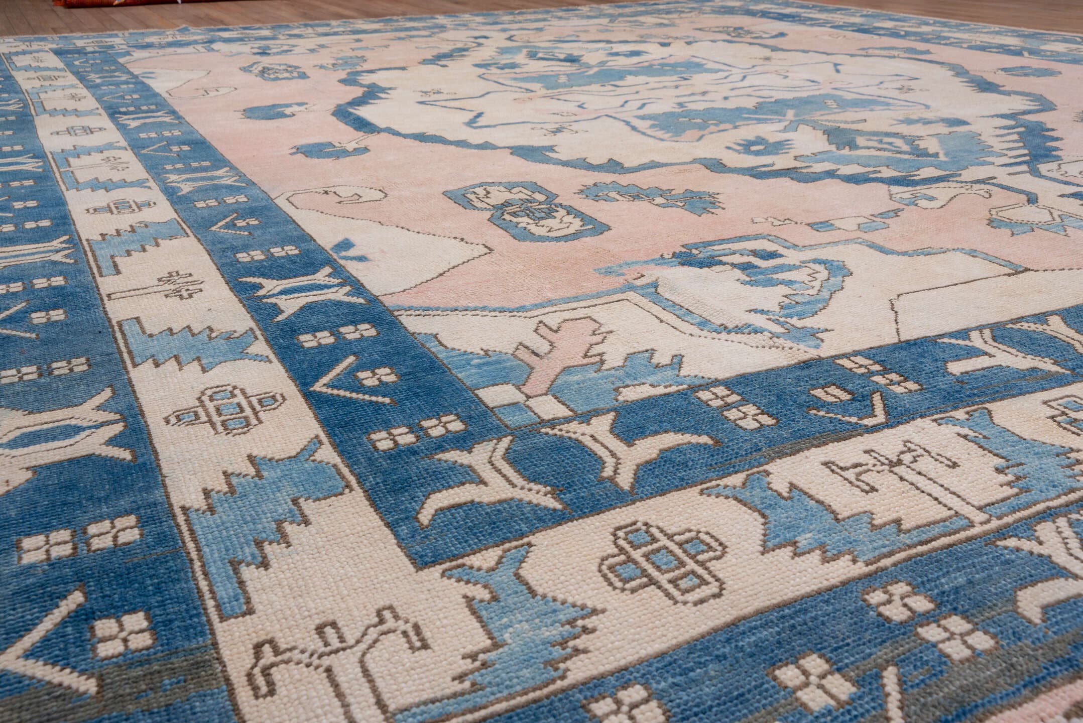 10' x 12' one-of-a-kind handmade vintage Oushak large size rug. Color palette: ivory, sky blue, blush, taupe, camel