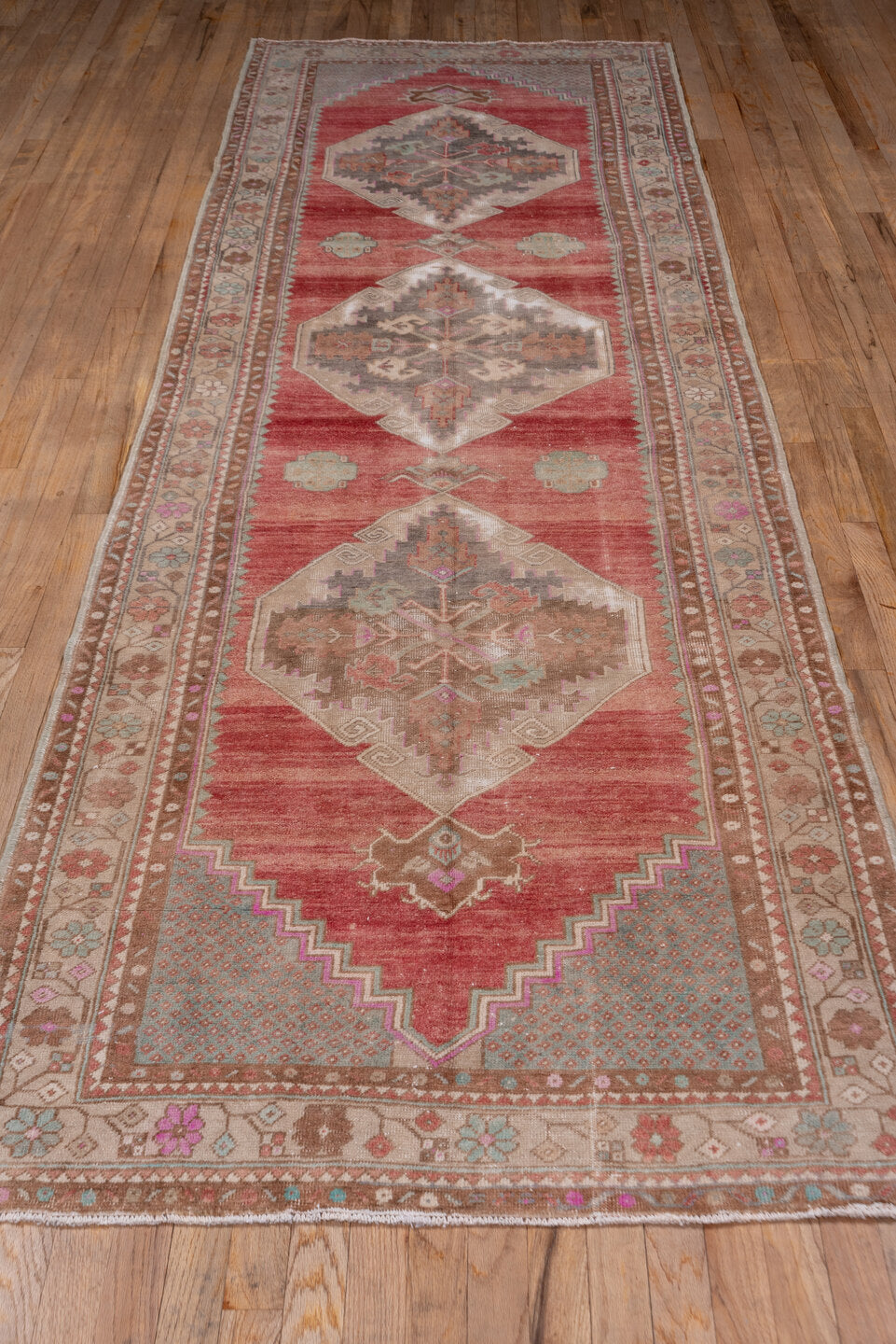 3' x 11' one-of-a-kind handmade vintage Oushak runner rug. Color palette: brown, gray, off-white, pink, red, snow, white