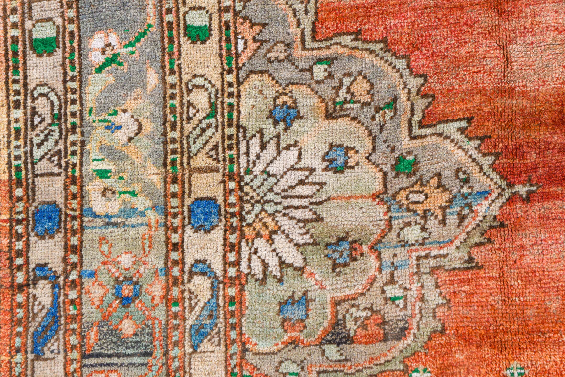 7' x 8' one-of-a-kind handmade vintage Oushak rug. Color palette: terra cotta, ivory, blue, sky blue, gray, rust, green